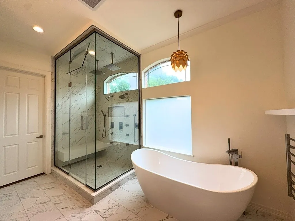 Primary bath with freestanding soaking tub and shower