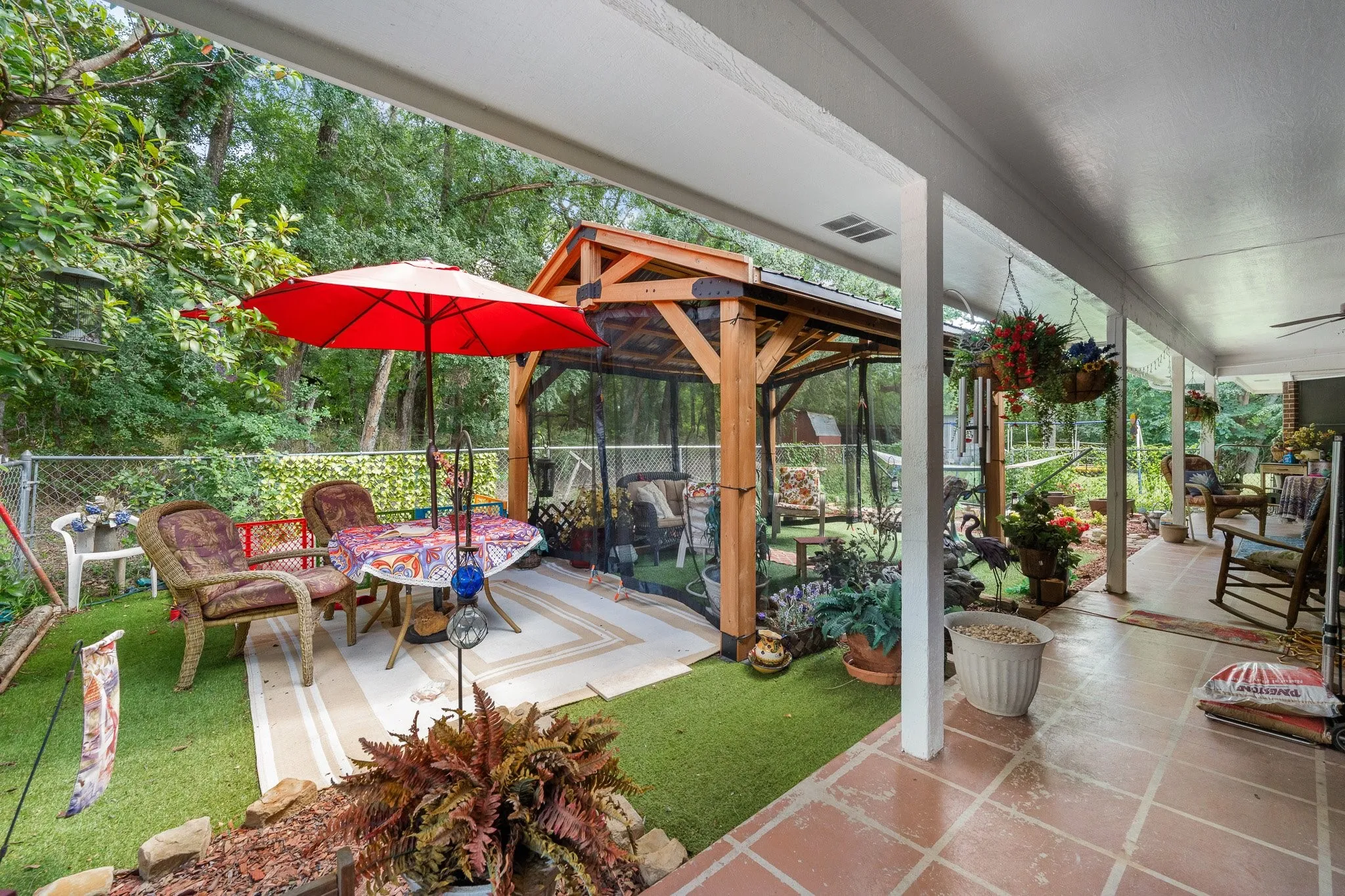 Such a whimsical yard space with multiple gathering areas.