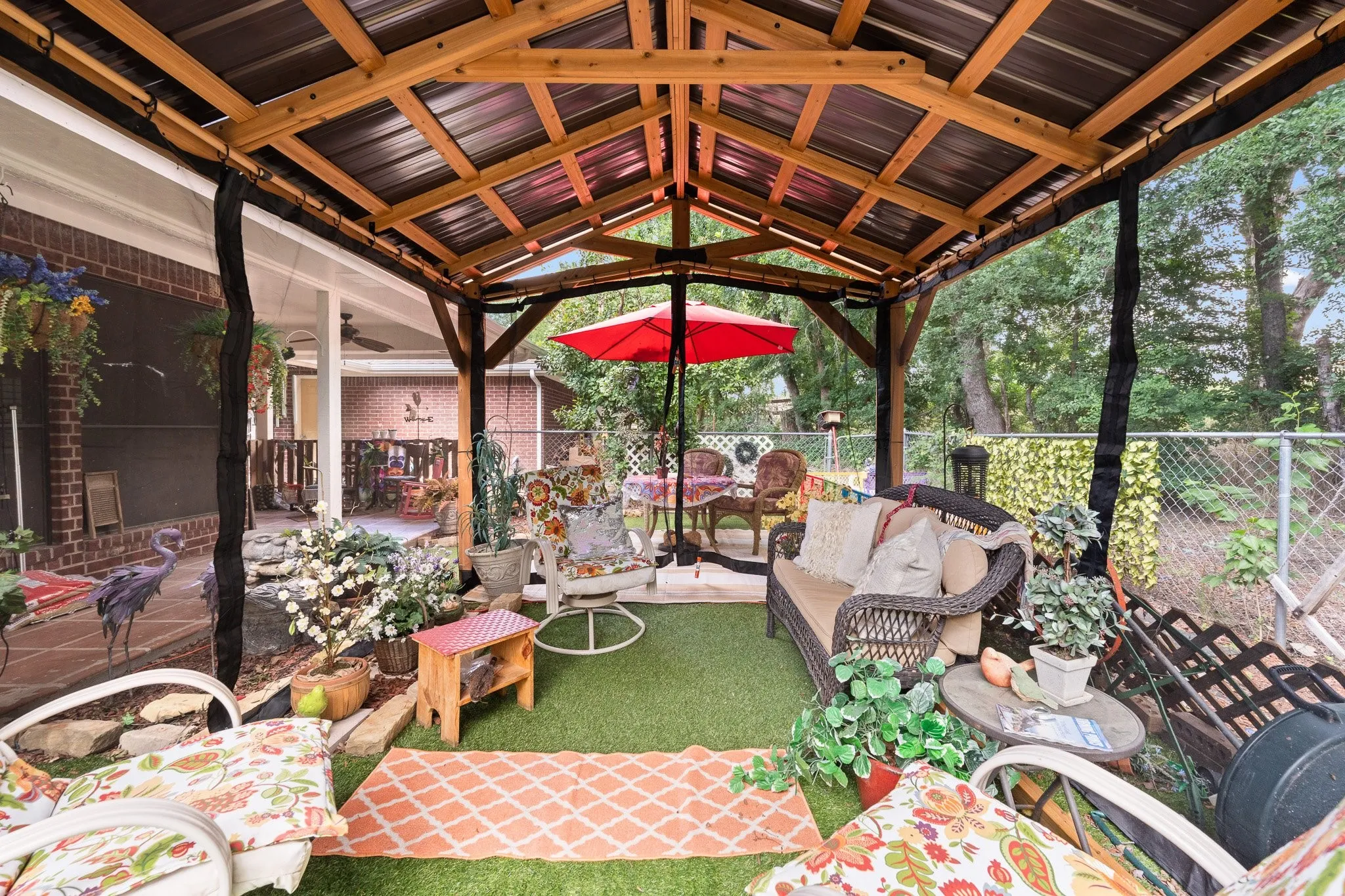 Pergola conveys with home. The perfect hang out spot for the family!