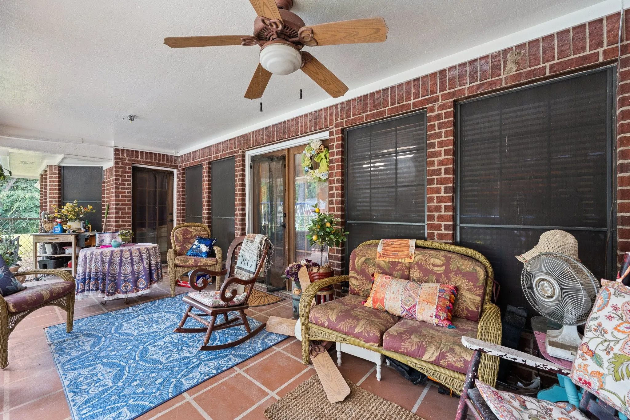 Wrap around porch offers multiple sitting areas