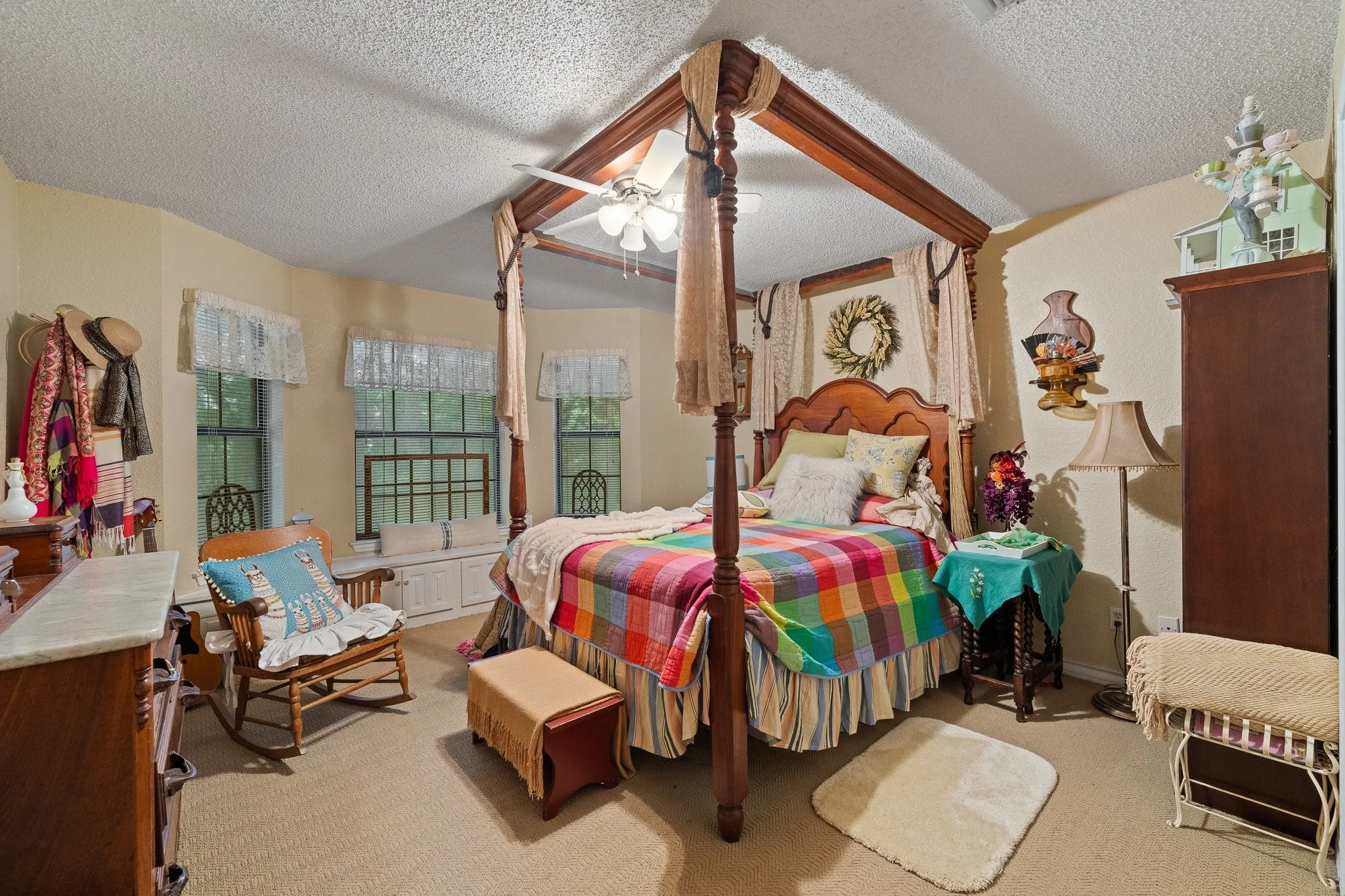 First of 4 bedrooms-this one features a bay window with bench seating area that doubles as storage.