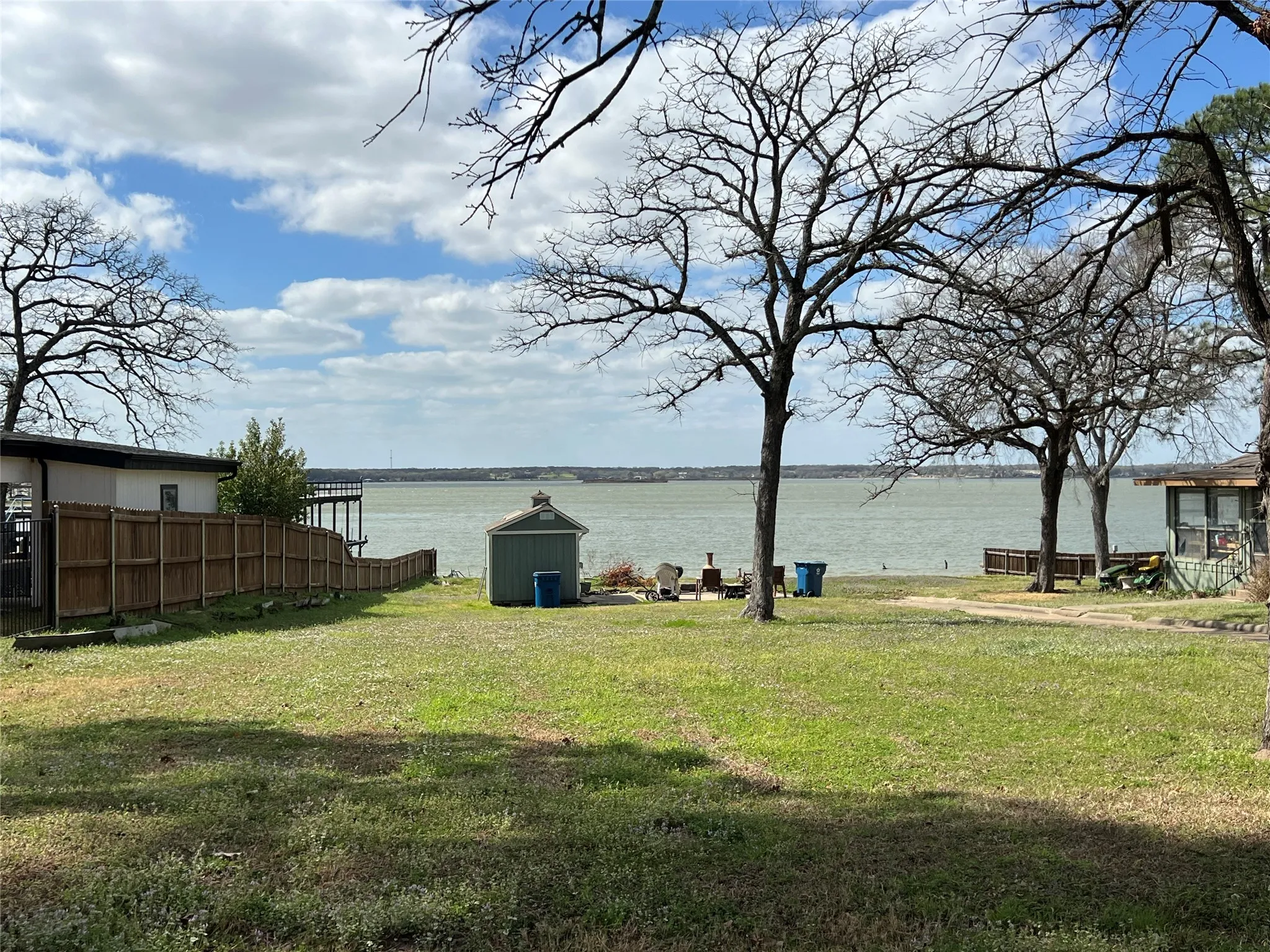 Expansive water front vacant lot adjacent to house waterfront lot
