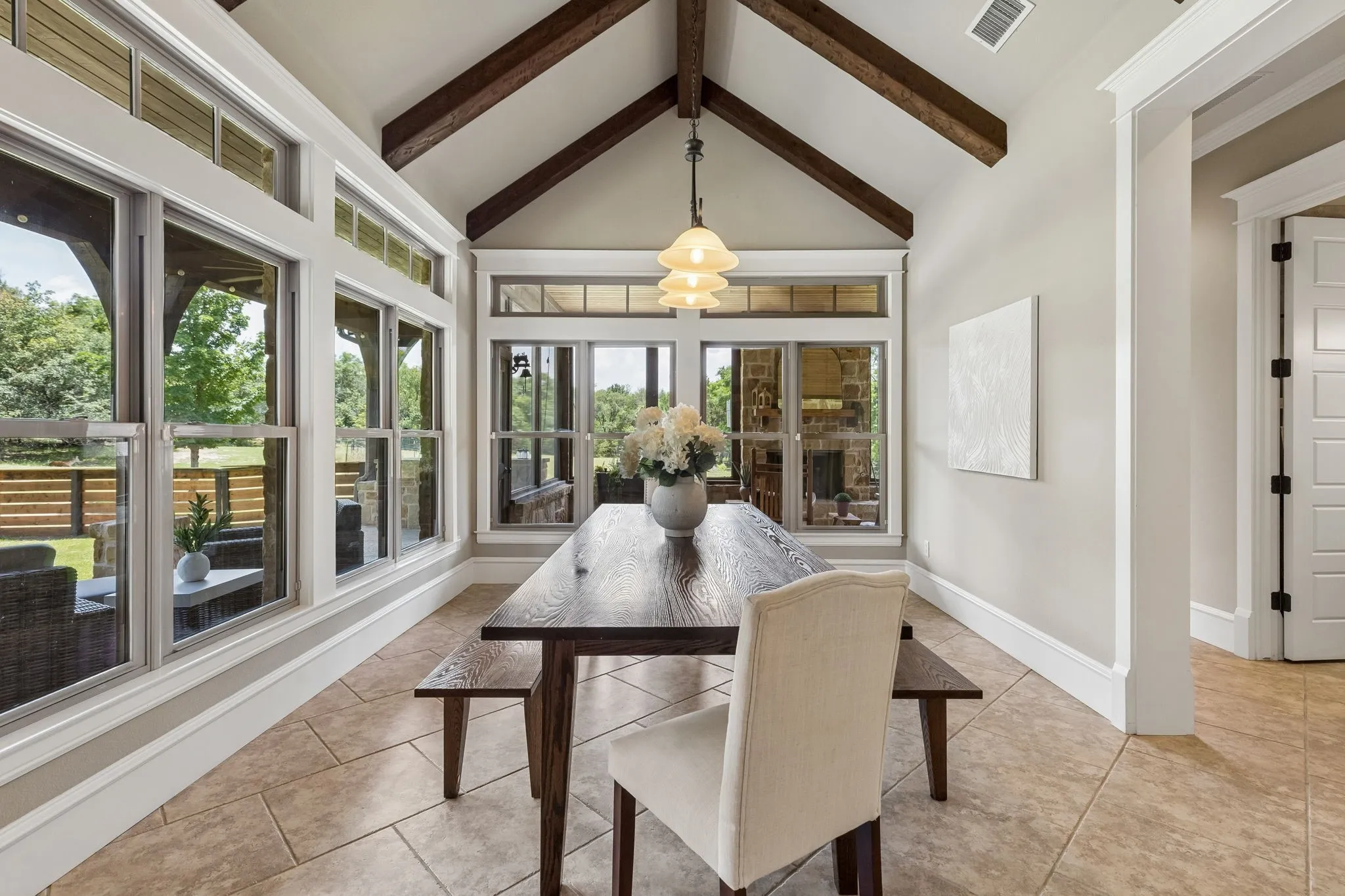 Secondary Dining Area with access to screened in porch