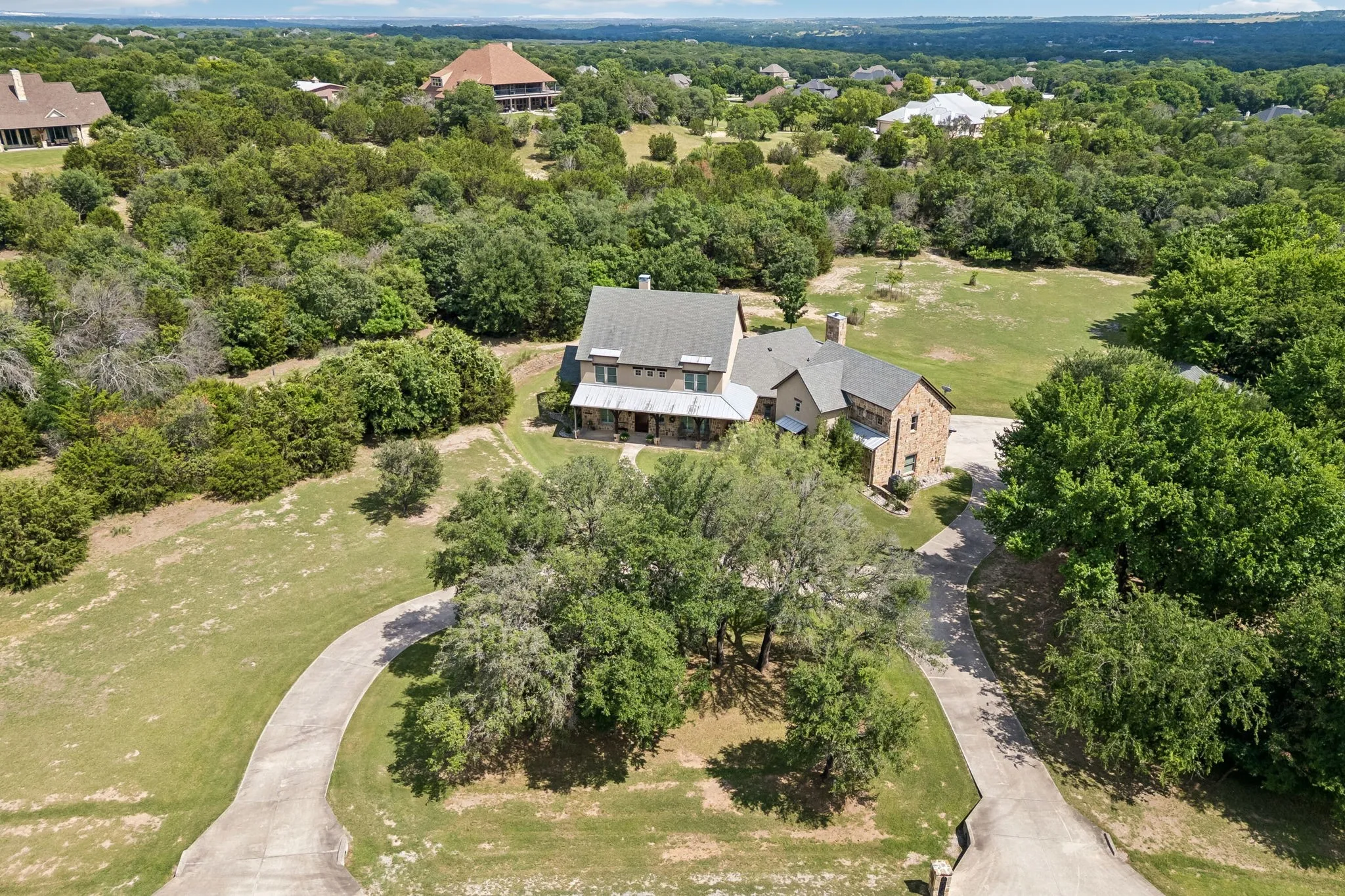 Aerial view of front with circle driveway