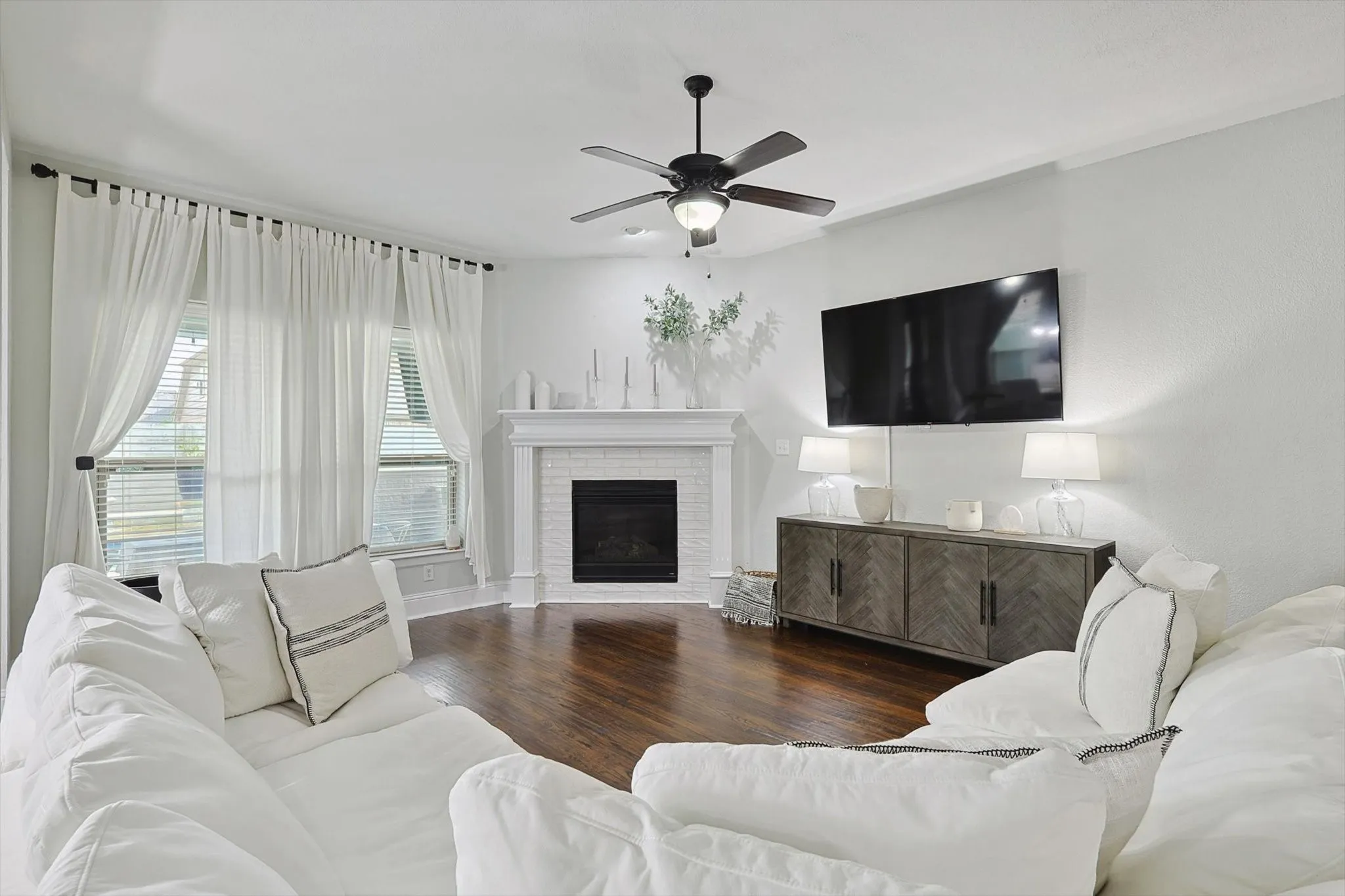 The fireplace anchors the living room area for those cozy winter nights.