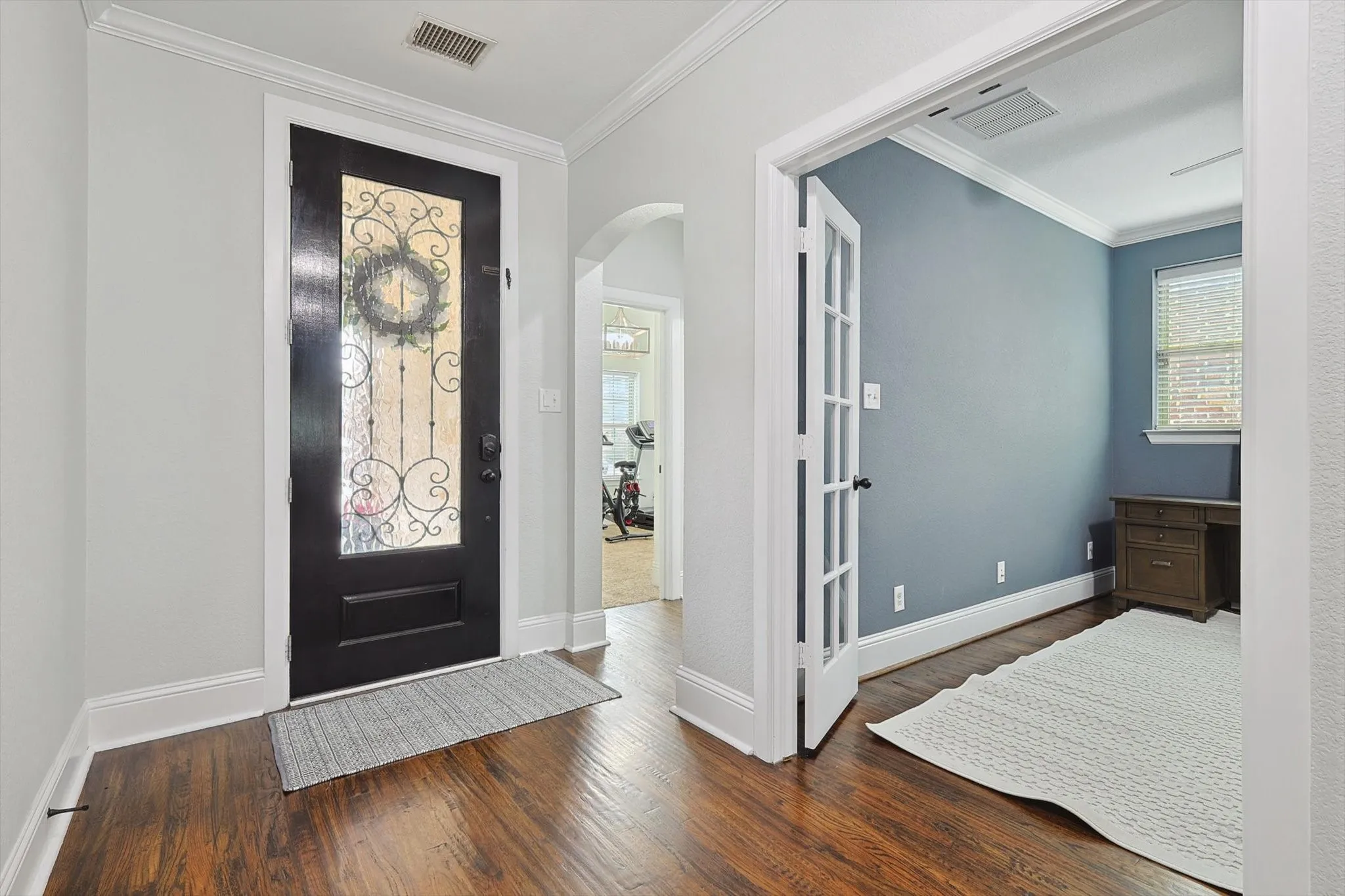 Hardwood flooring throughout.