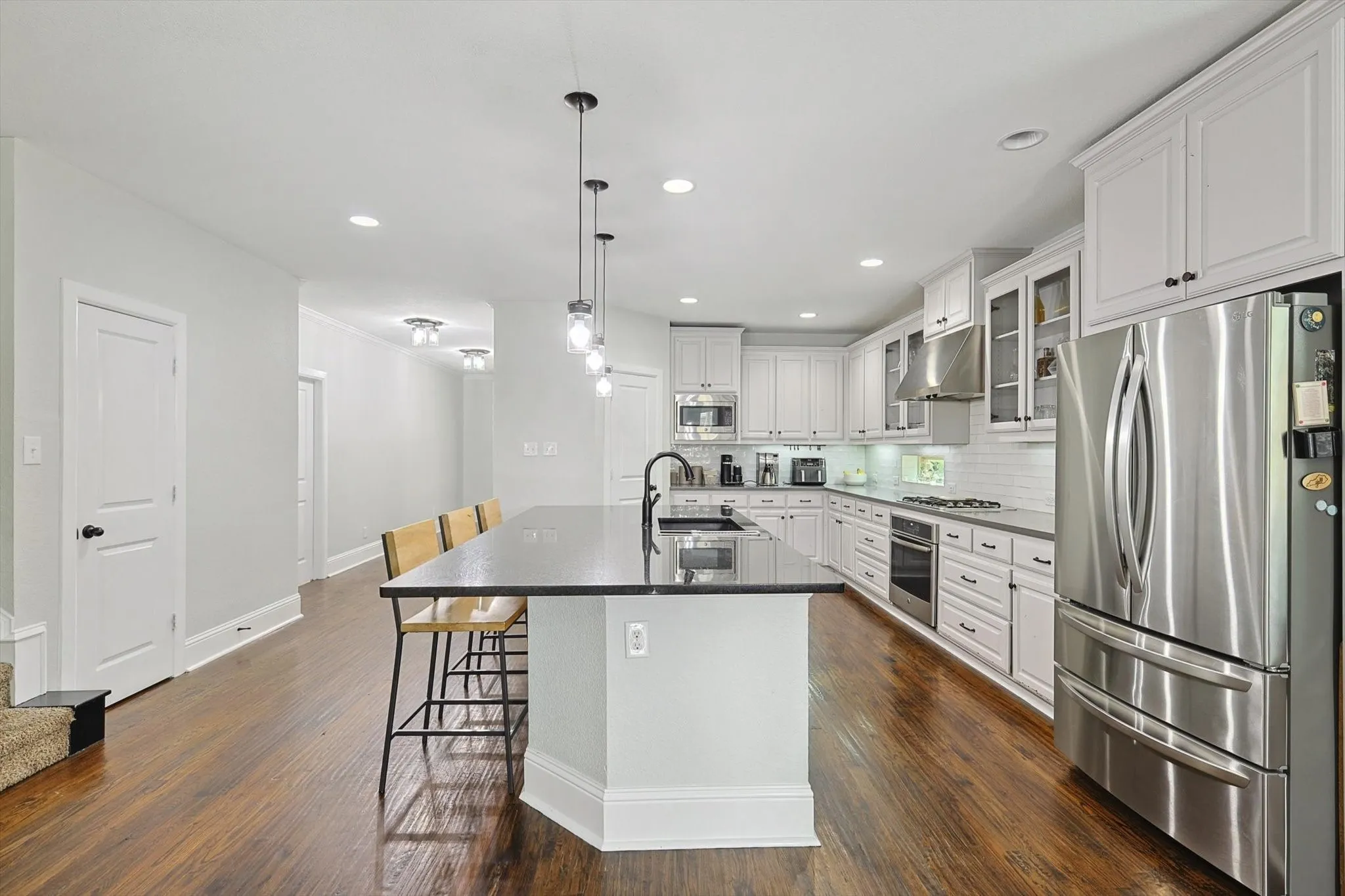 Hardwood flooring throughout.