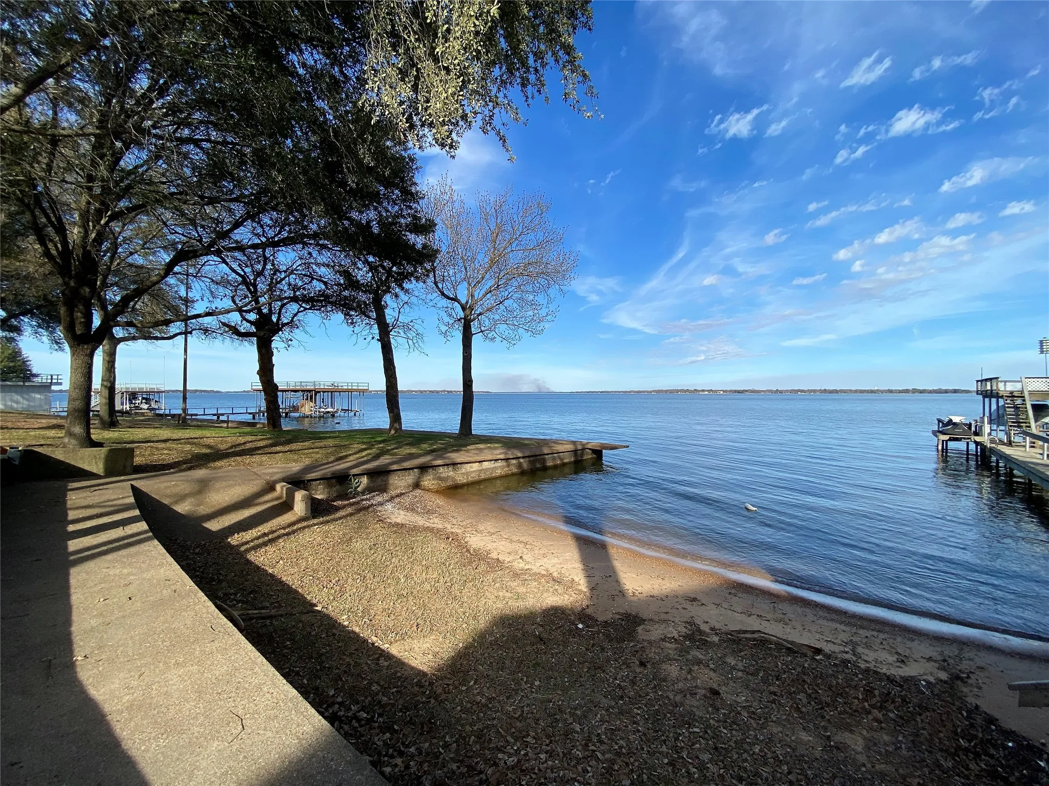 Community beach and boat launch 1 minute walk from backyard
