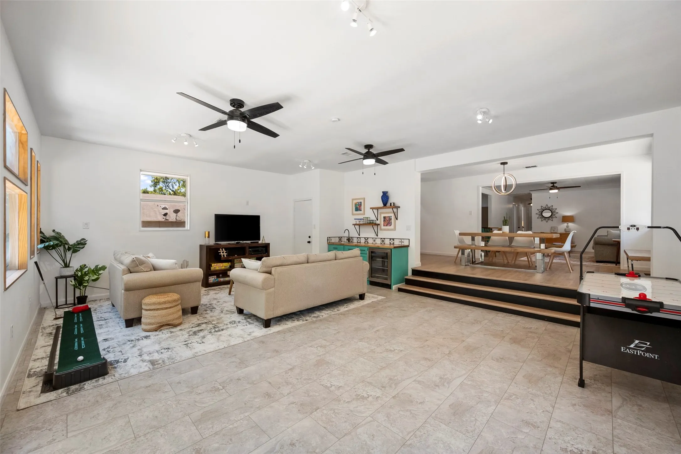 large entertainment game room with bar