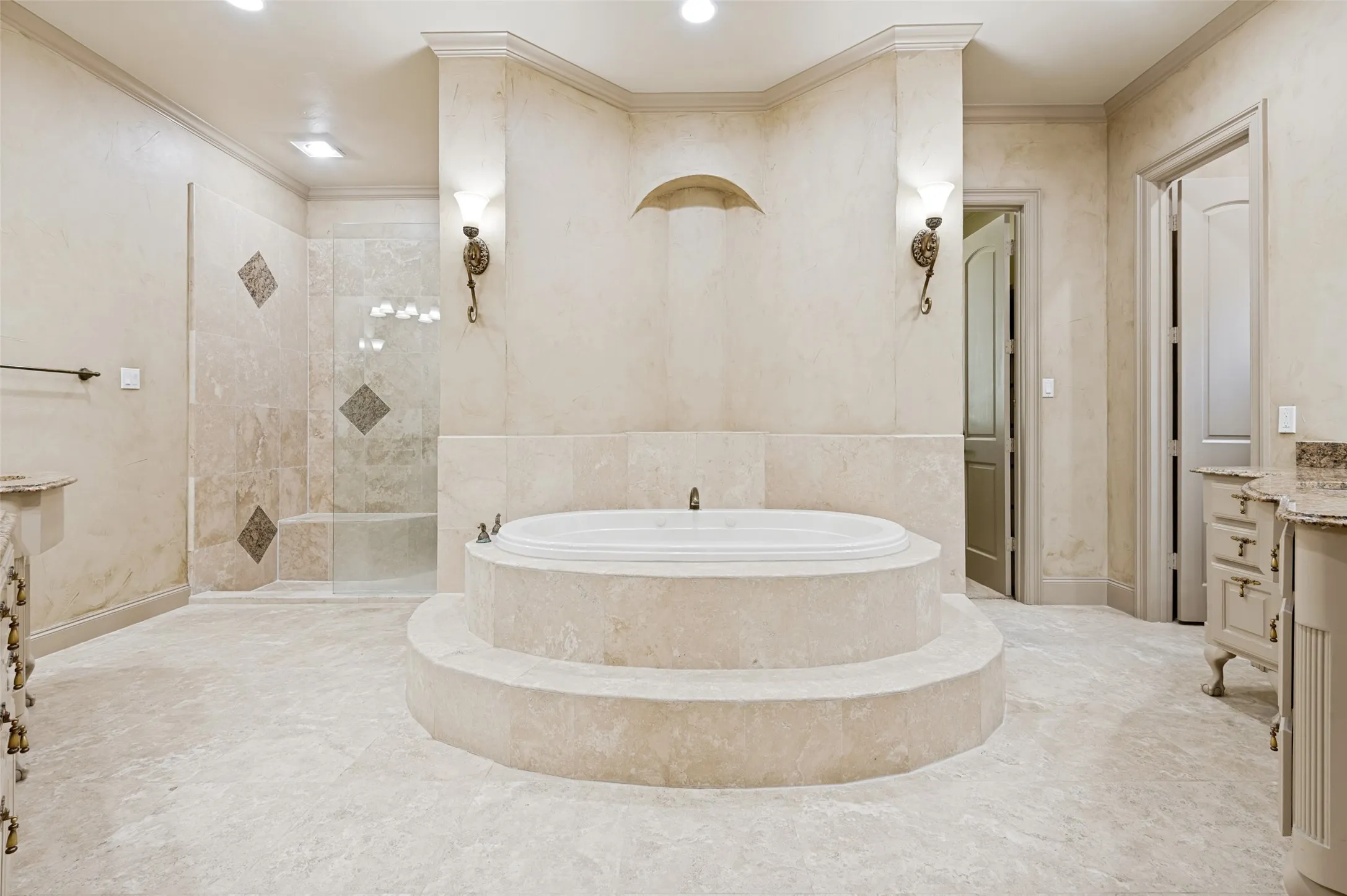 Definately Luxury-
oversized shower to right behine tub