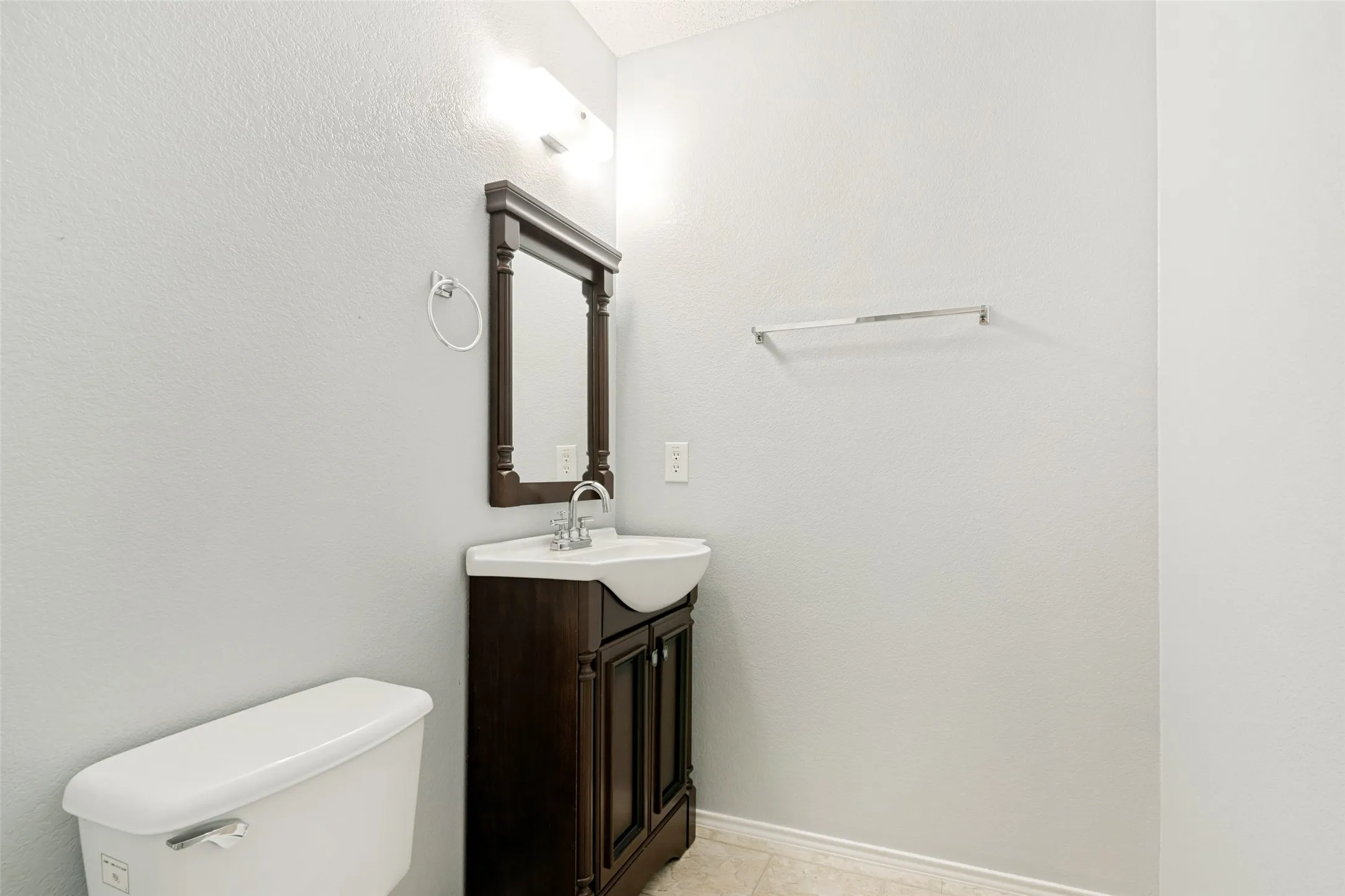 Half bath off of living area, 1st floor