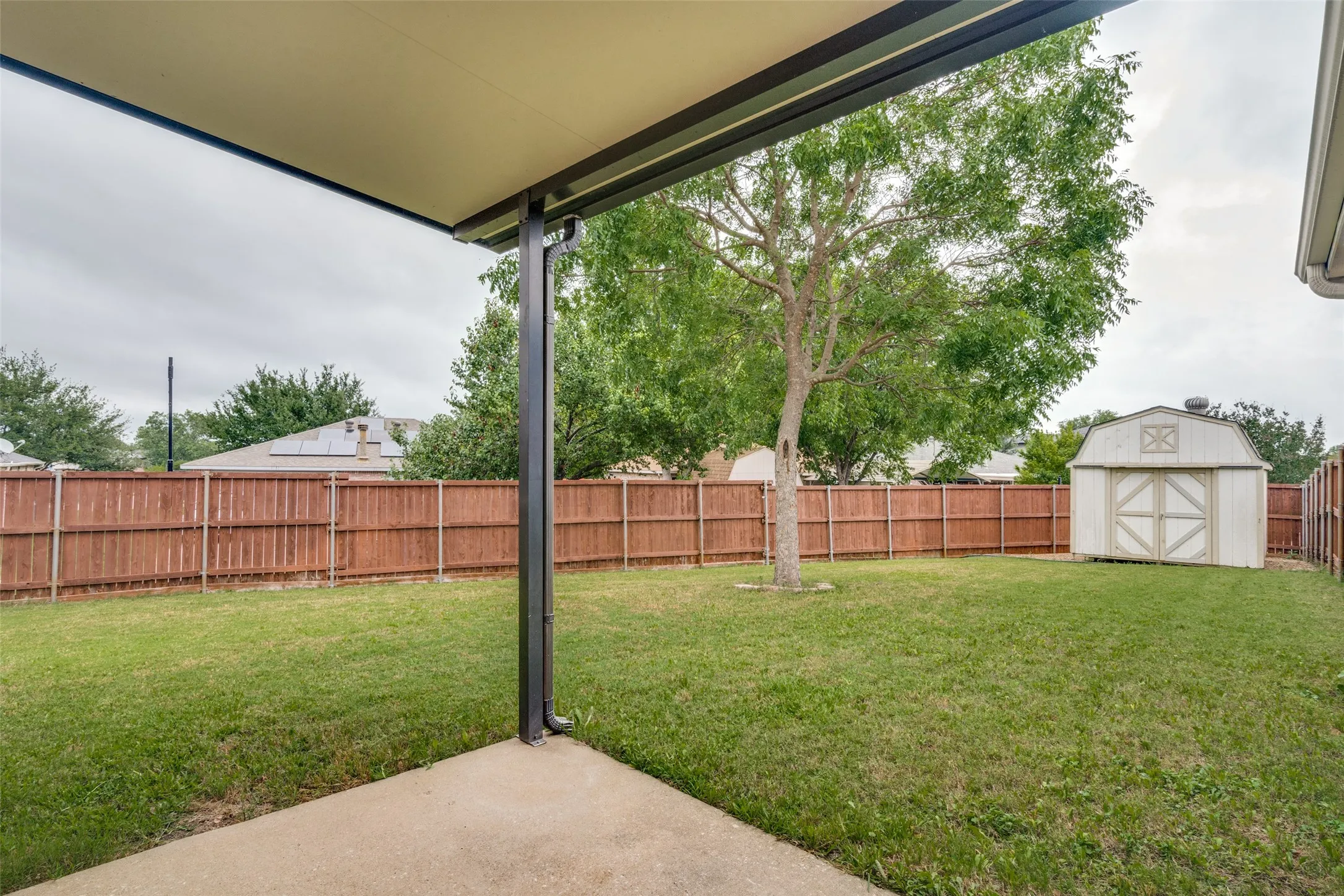 Large backyard with 10X12 storage shed