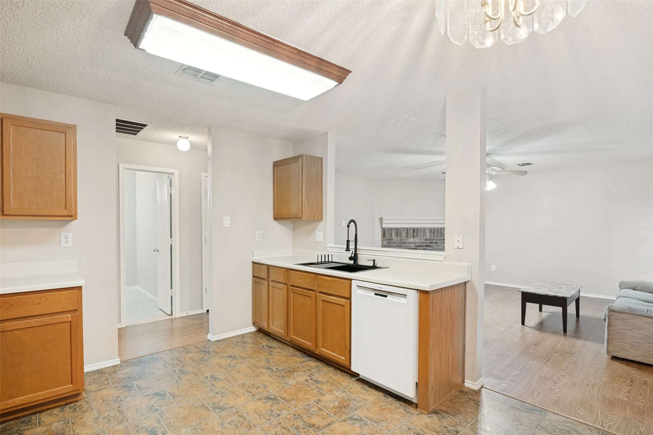 Kitchen open to living area for ease of entertaining.