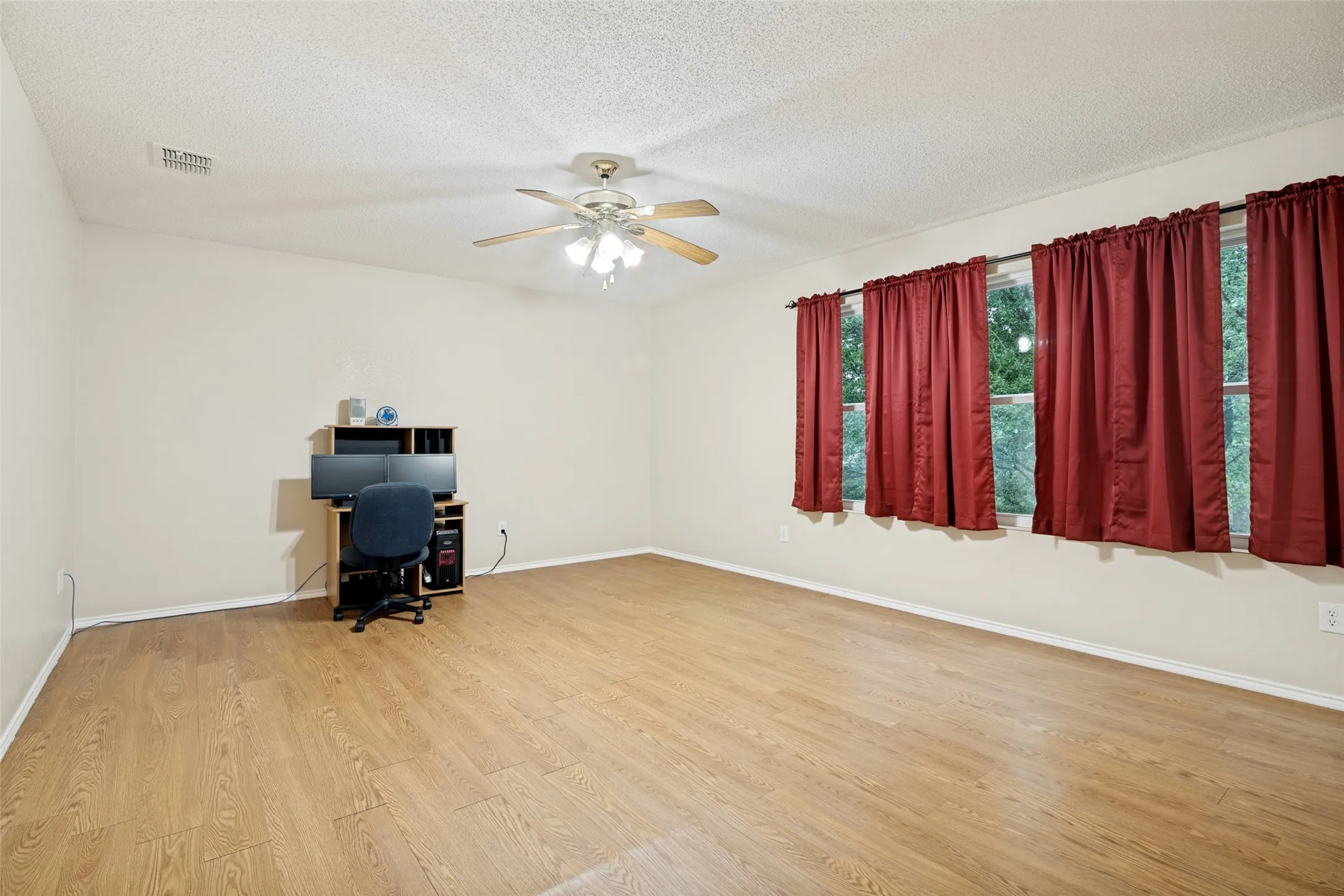 1 of 3 generously sized bedroom upstairs.