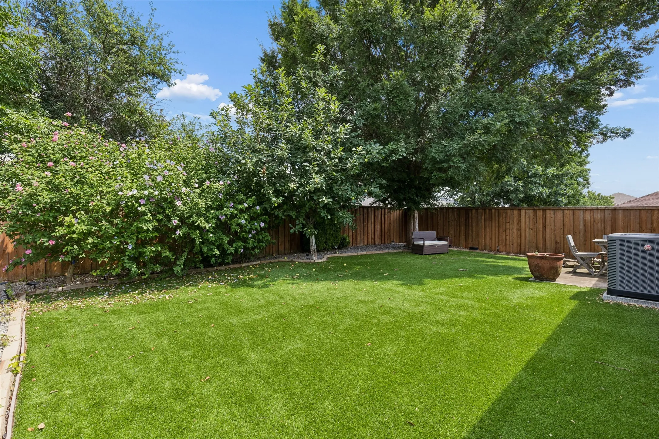 Retreat to your quiet yard with tons of space for pets and play.