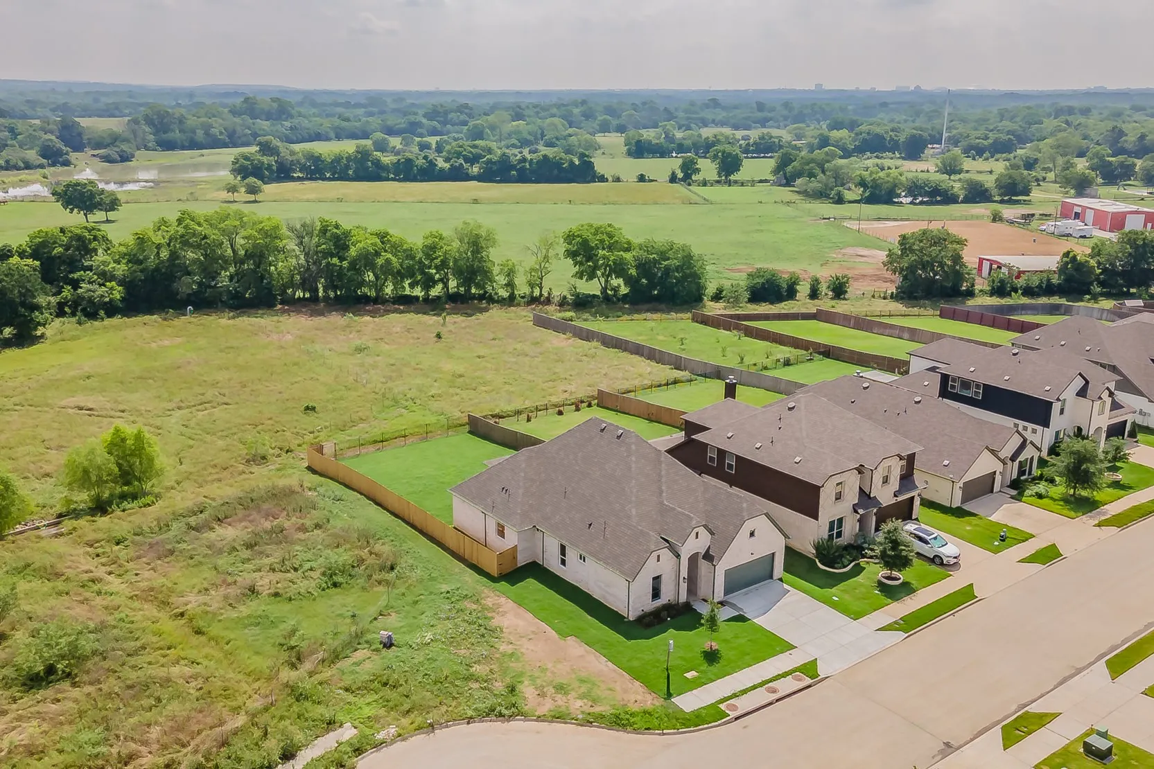 Enjoy relaxing in this peaceful community backing up to land for a country feeling
