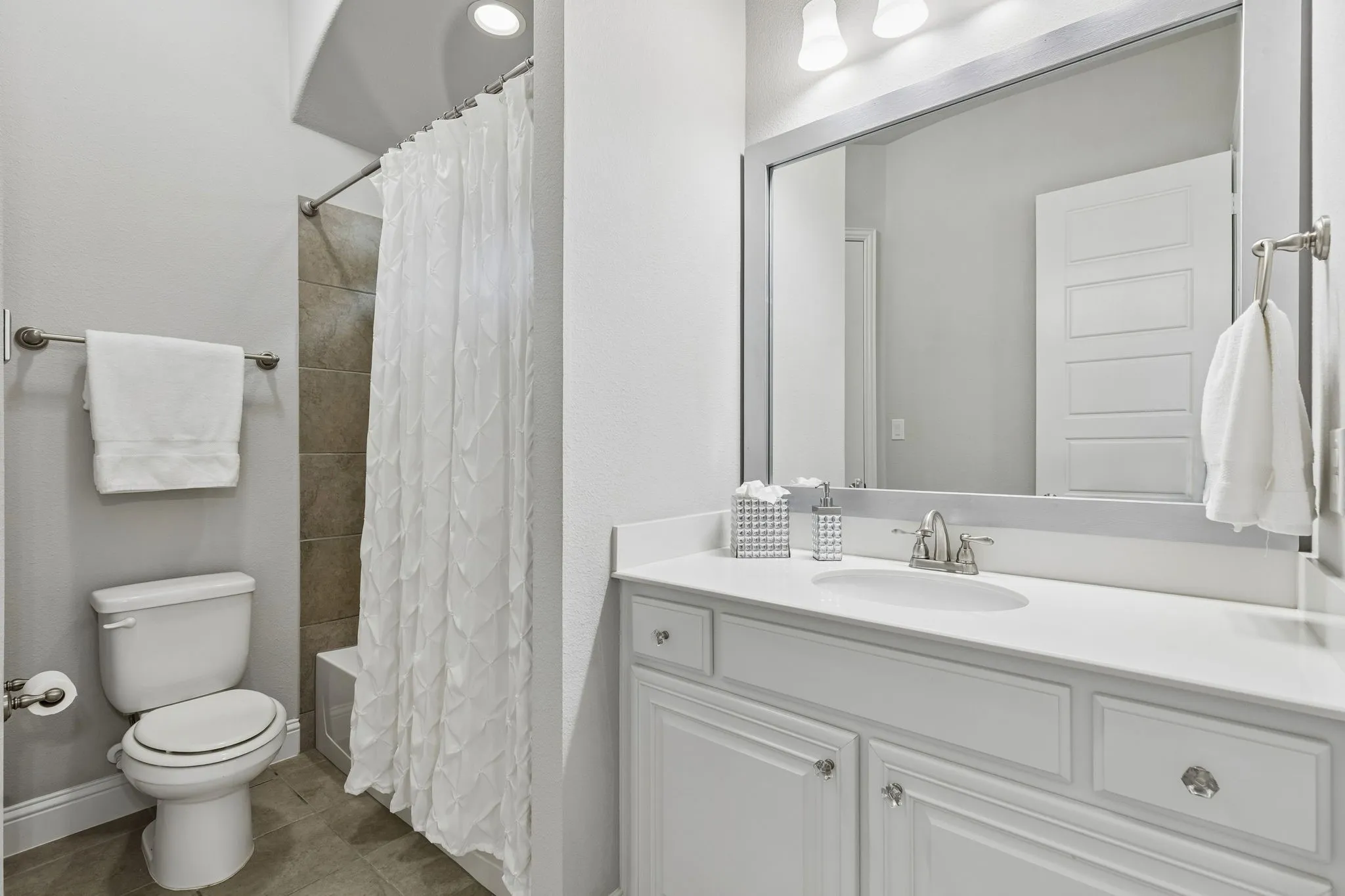 Ensuite bath & WI closet in second bedroom on main floor.