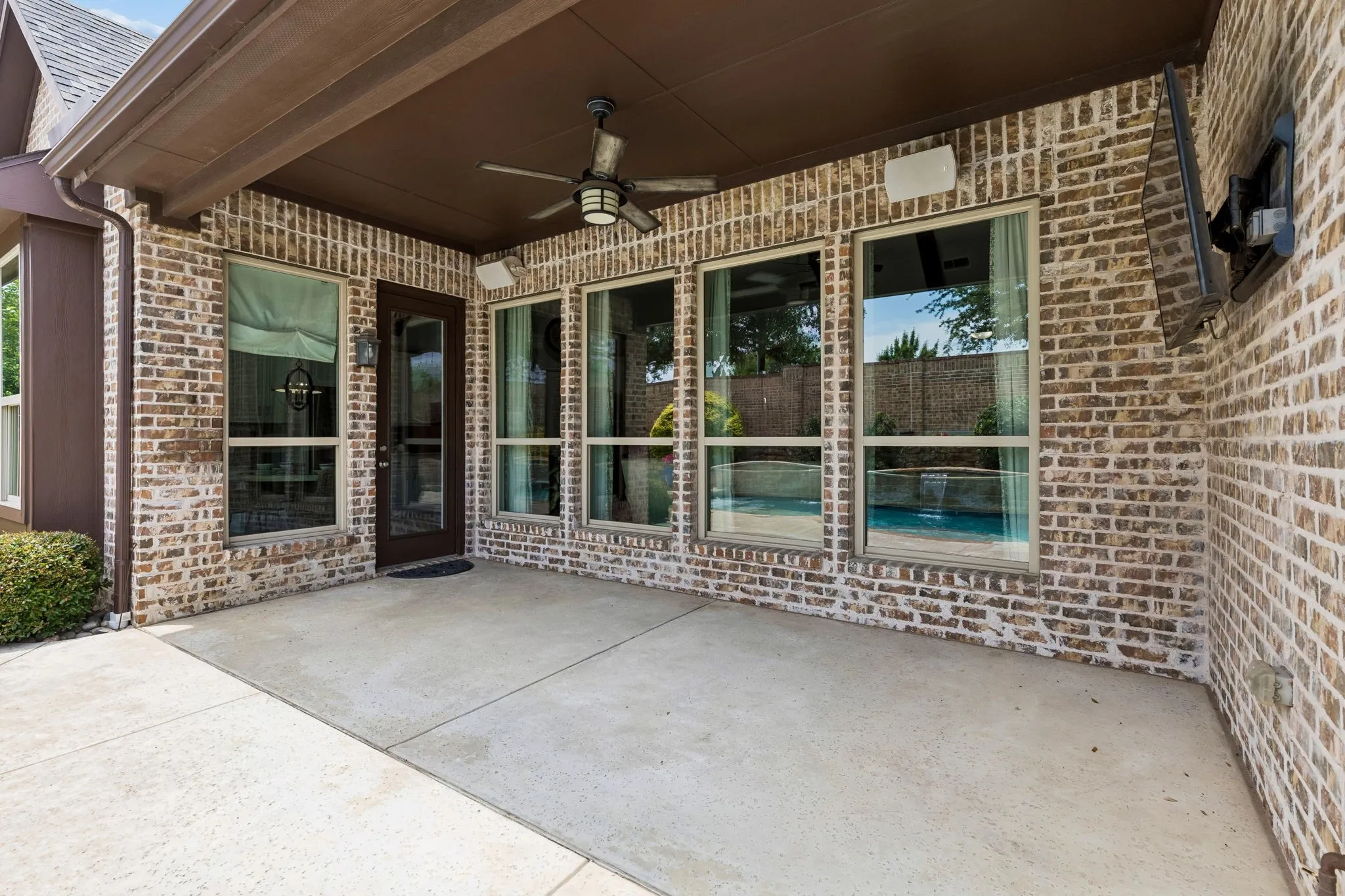Large covered pation extends living space outdoors.