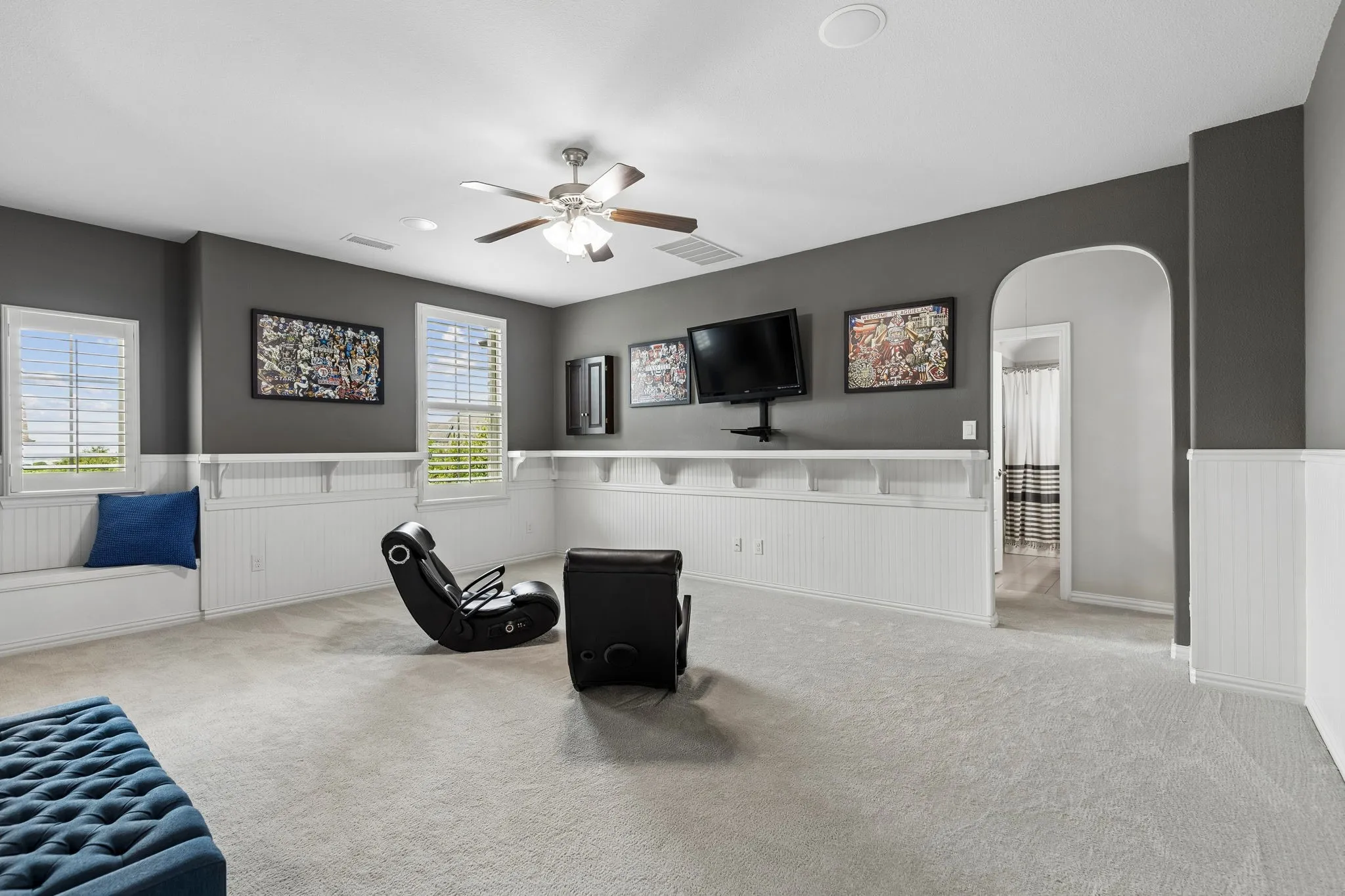 Warm game room sports wainscotting & drink rail - perfect for watching the game and entertaining.