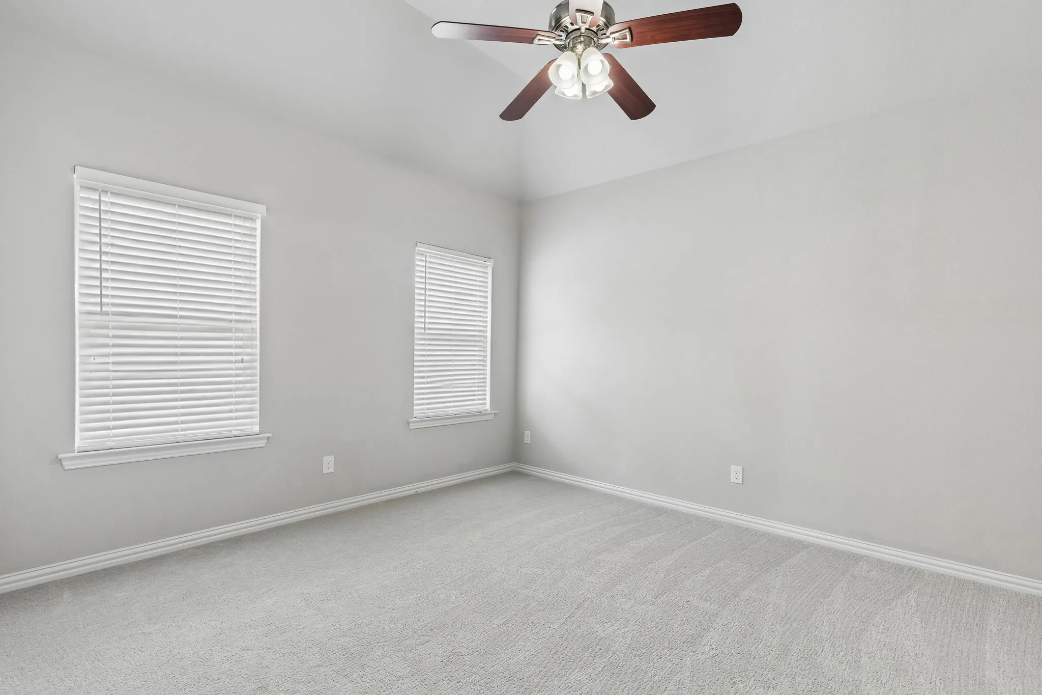 Upstairs bedroom 2 with new carpet, fan & light kit.