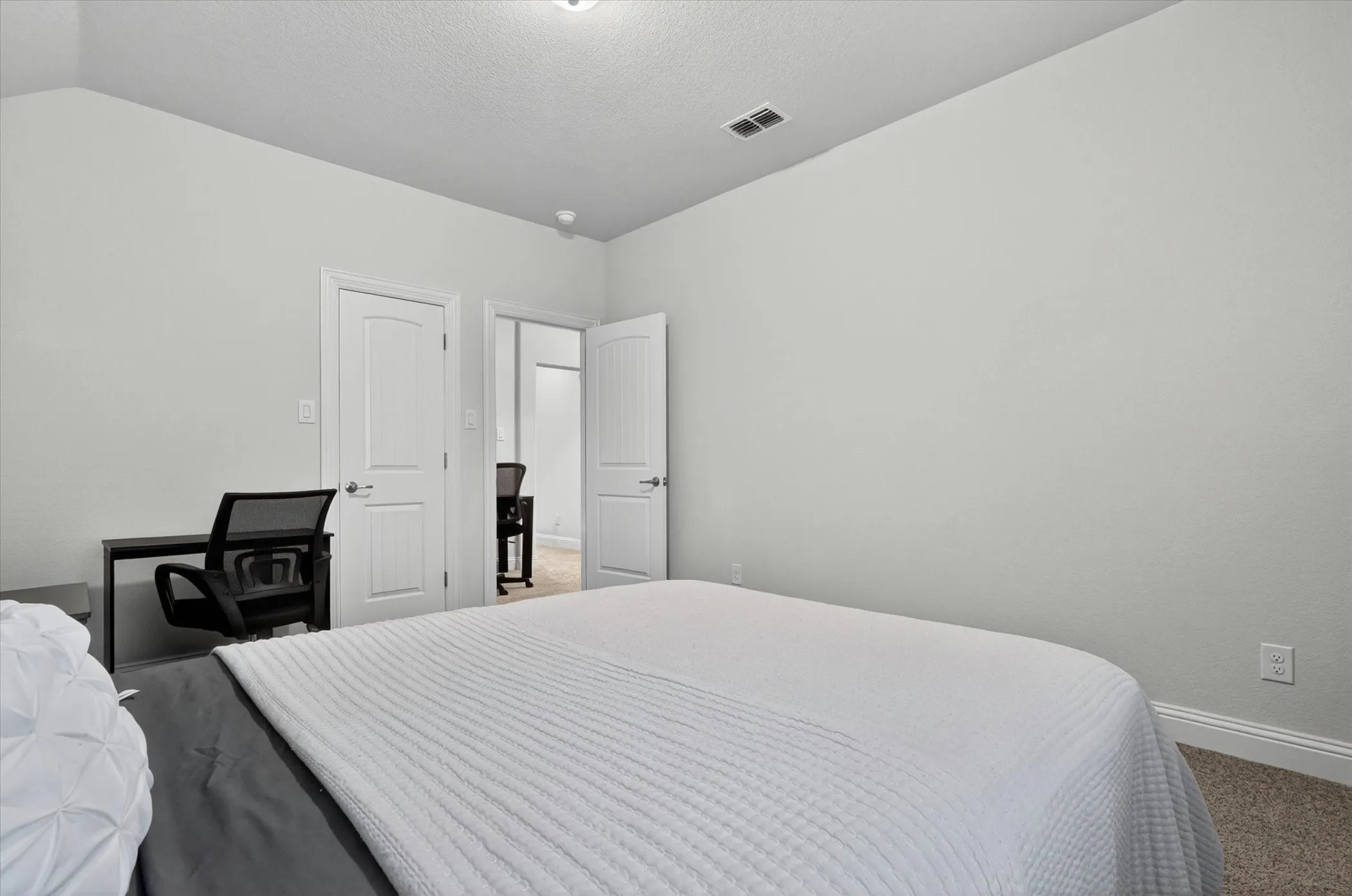 Neutral-toned interior room with light grey walls and white trim