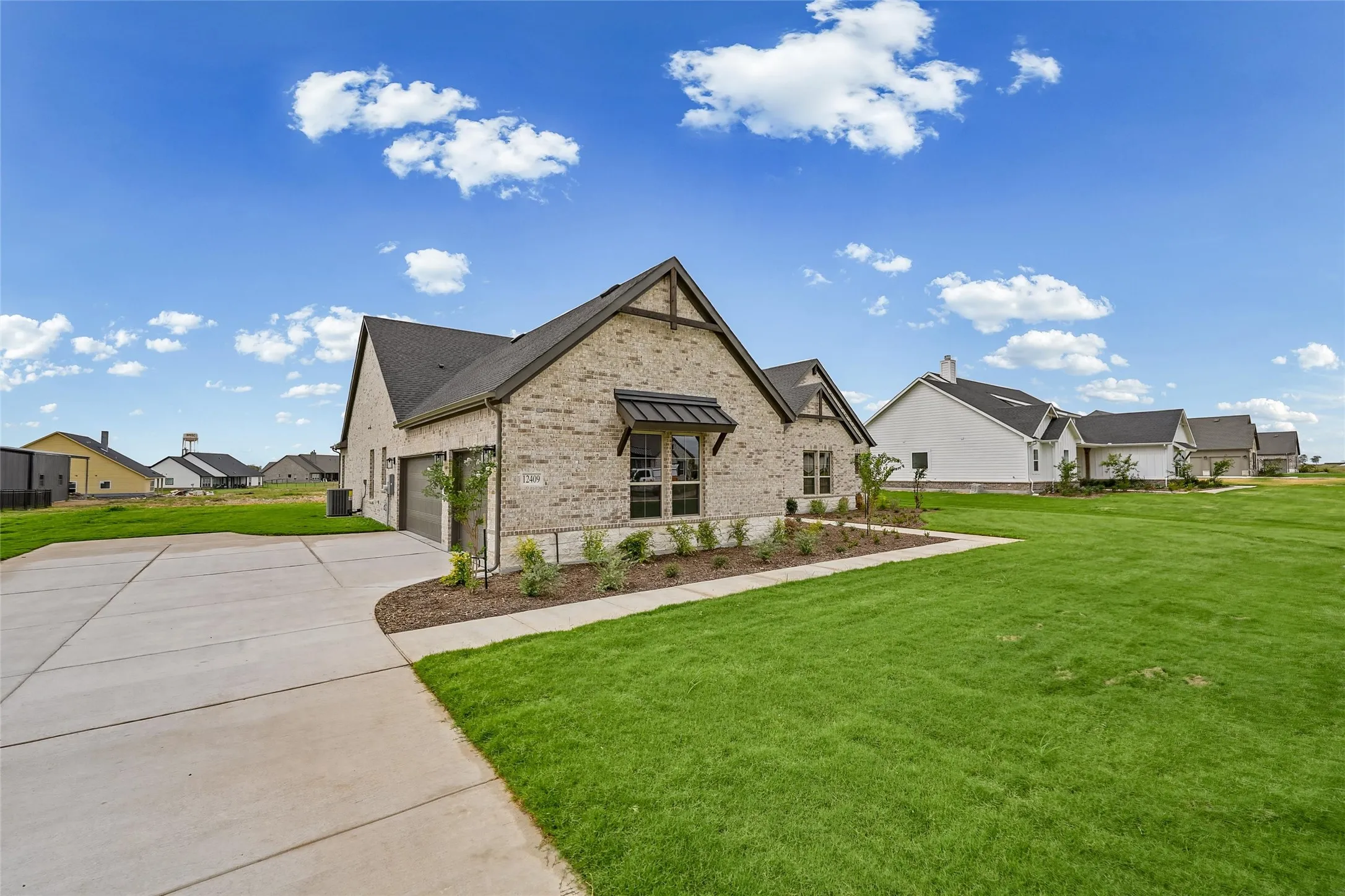 Stone and brick exterior with dark trim accents