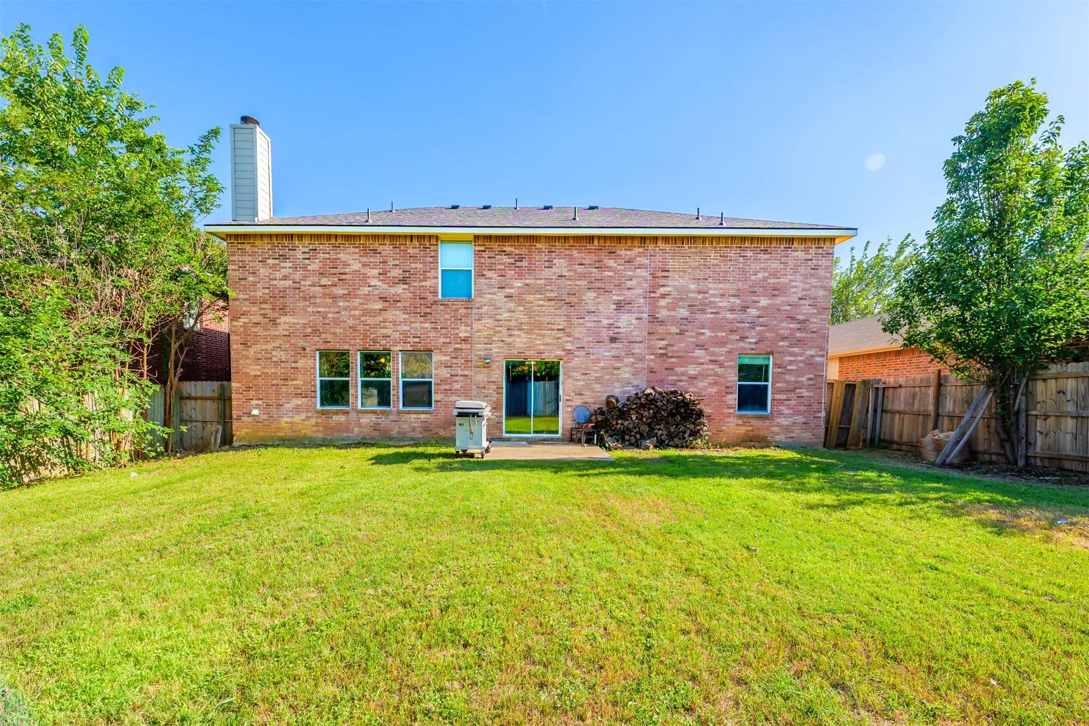 Expansive green lawn providing ample outdoor space