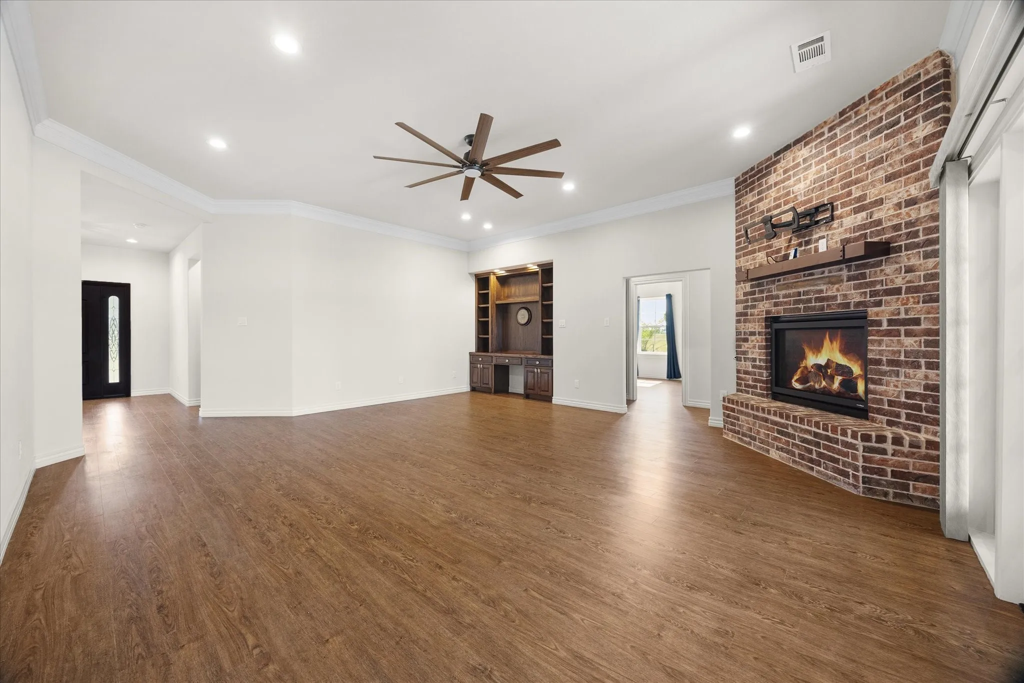 Custom built in adorn this lovely family room