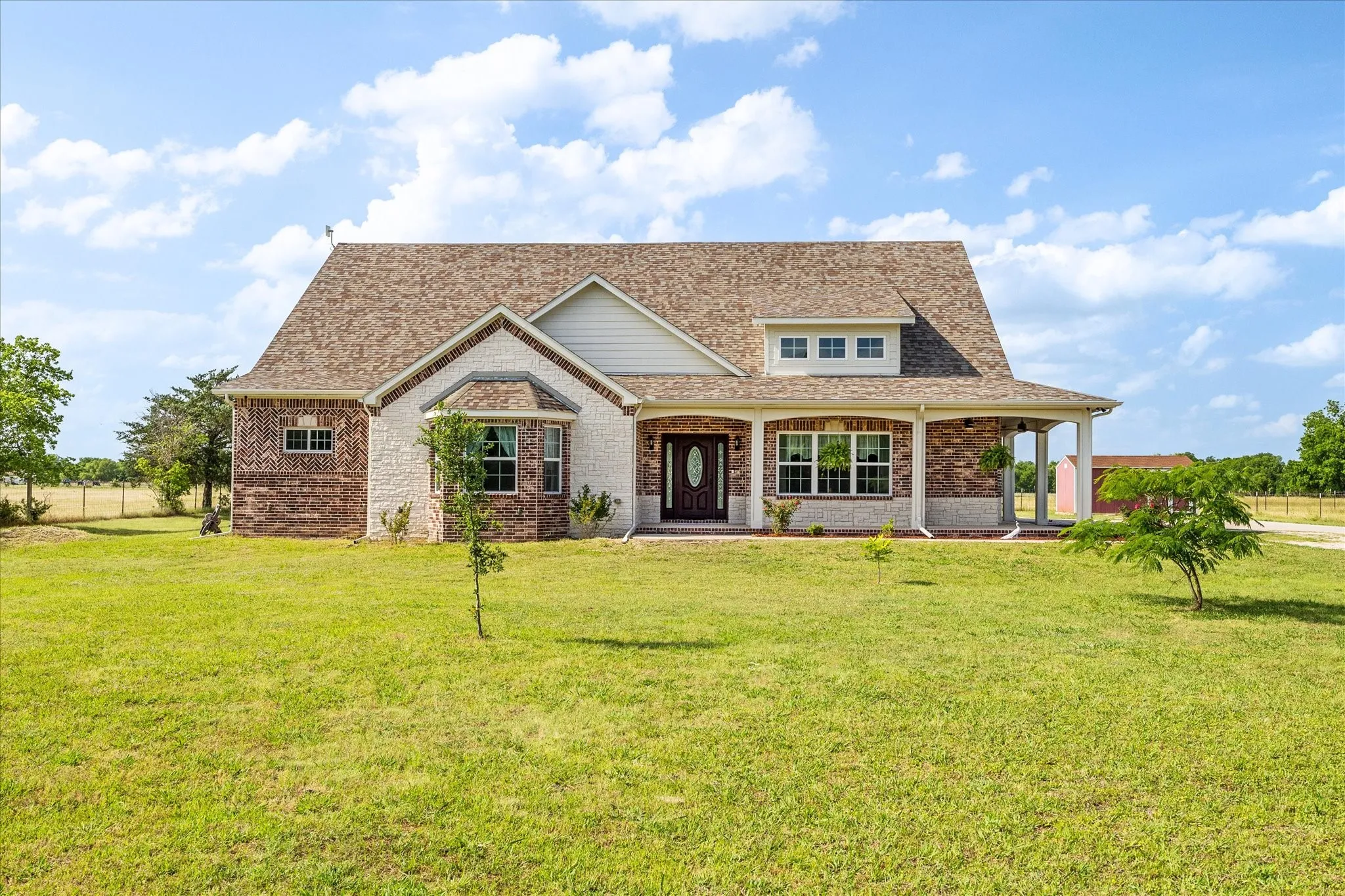Stunning curb appeal beckons you inside