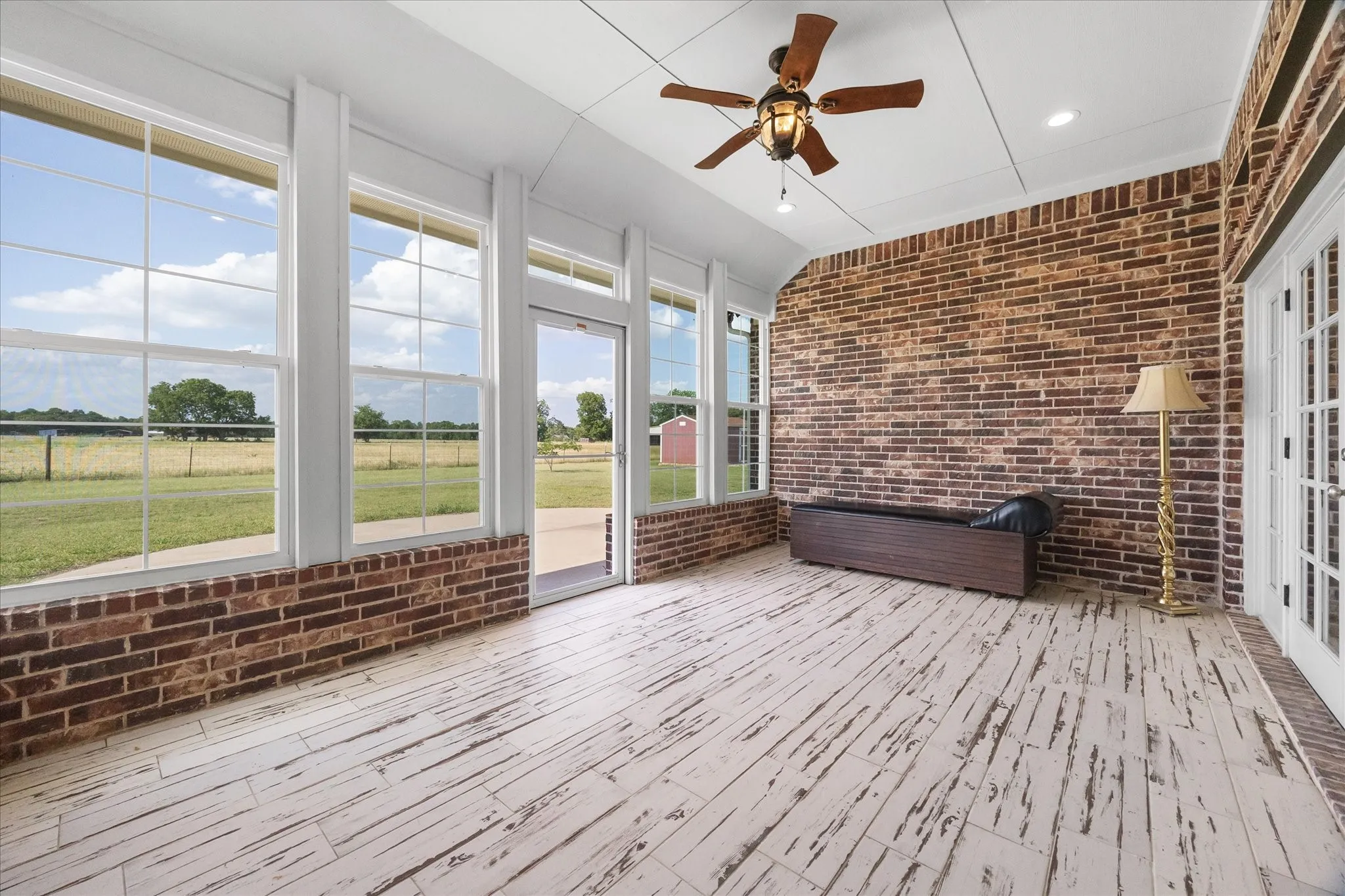 Enjoy the great outdoors all year long in this heated and cooled Florida room