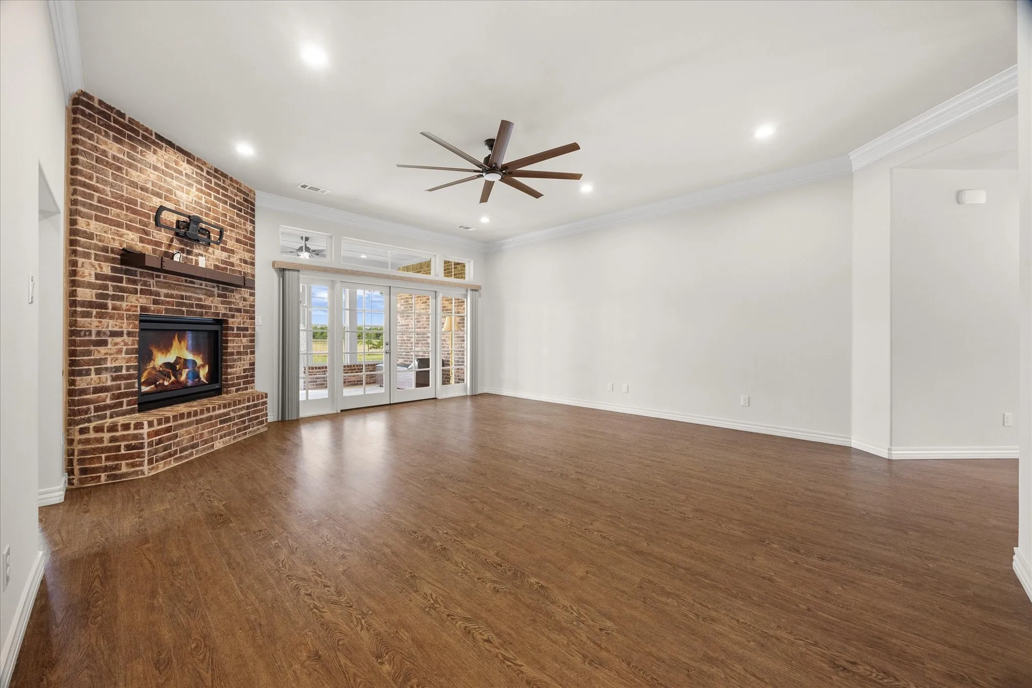Floor to ceiling fireplace includes upscale heatalator system providing comfort and enjoyment for your family room.