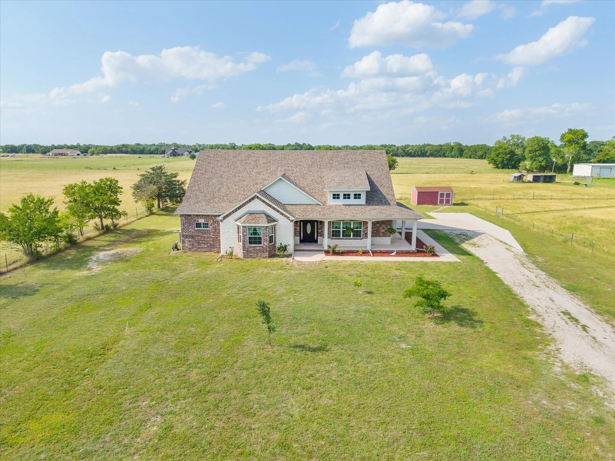Extended drive provides ample parking for family and guests
