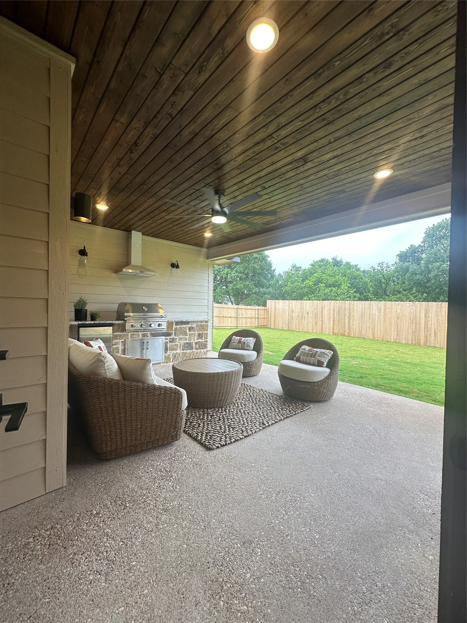 Covered patio featuring a wood-finish ceiling, recessed lighting, and a ceiling fan