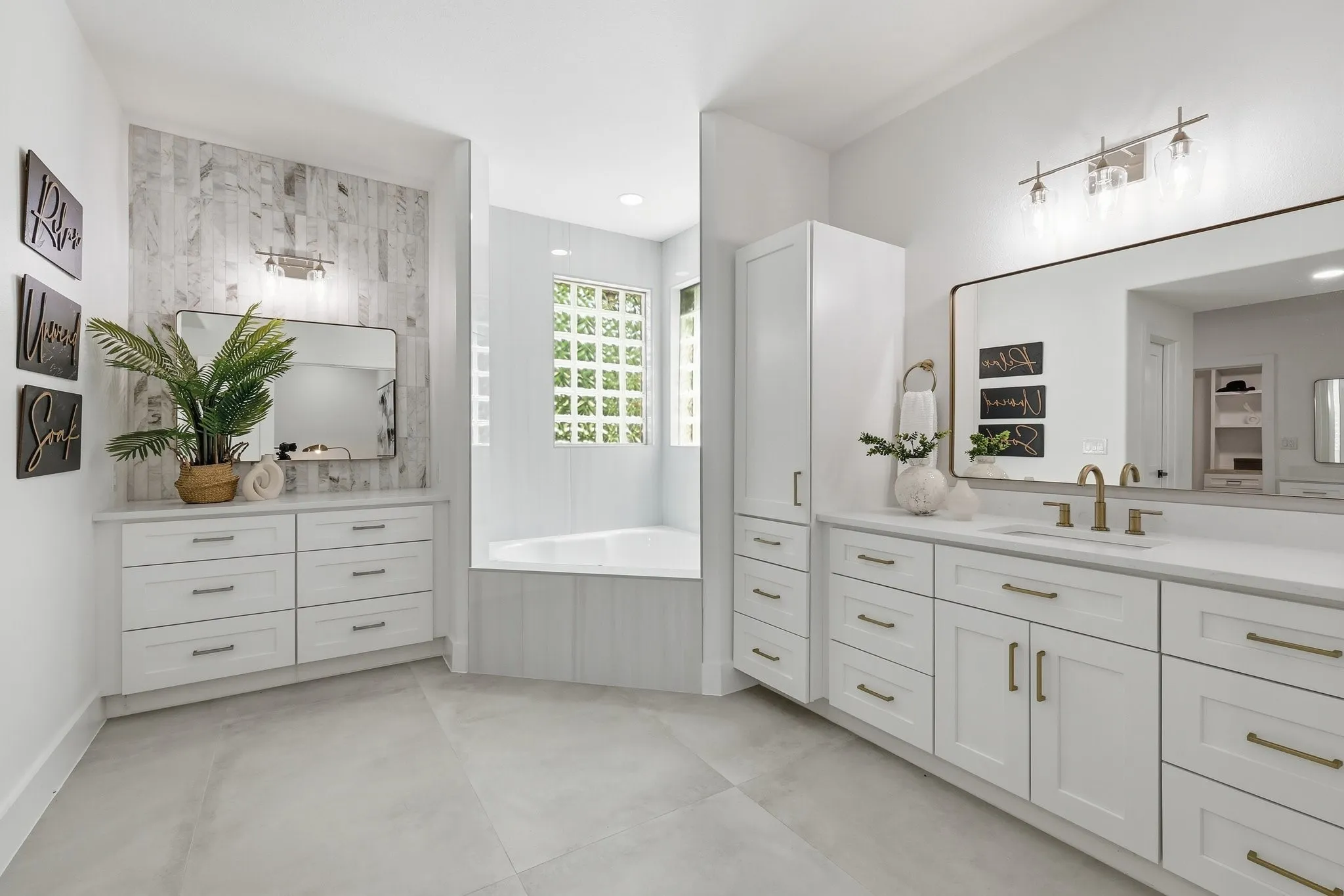 210 Canyon Oaks, Argyle, TX 76226 - Primary Bathroom - Dual vanity bathroom featuring a built-in soaking tub and glass block window