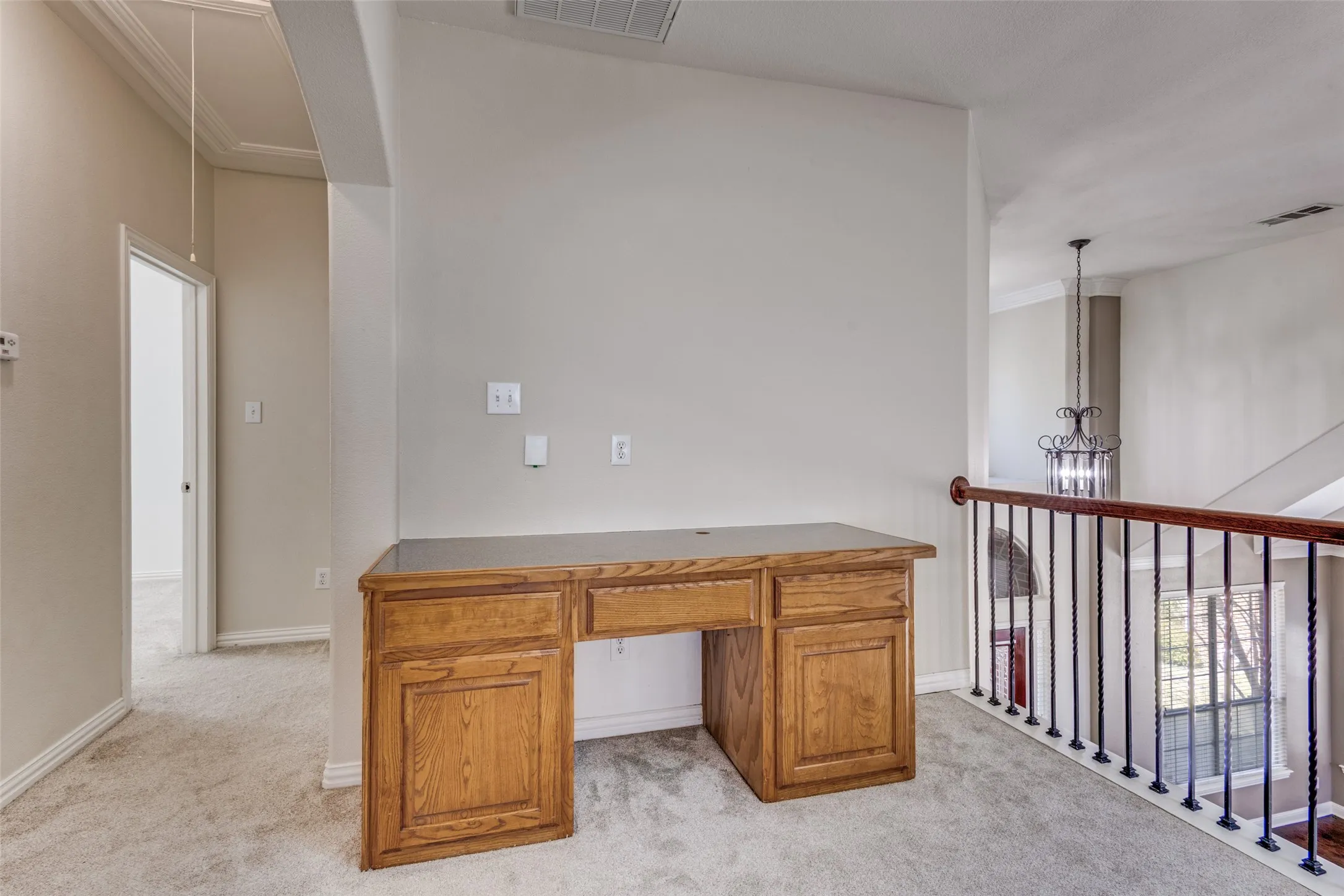 Upstairs room with ceiling fan, light carpet, and vaulted ceiling, creating a versatile space that can function as a bedroom, bonus room, media retreat, children’s hangout, or flexible living area in this larger McKinney home for sale with excellent square footage and a highly desirable North Texas location.
