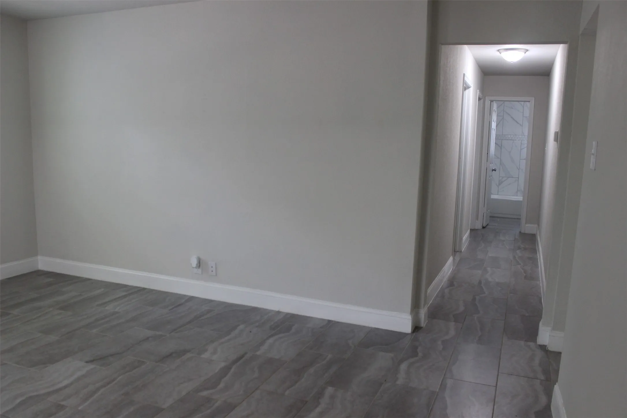 View from the family room to the hallway and the two bedrooms