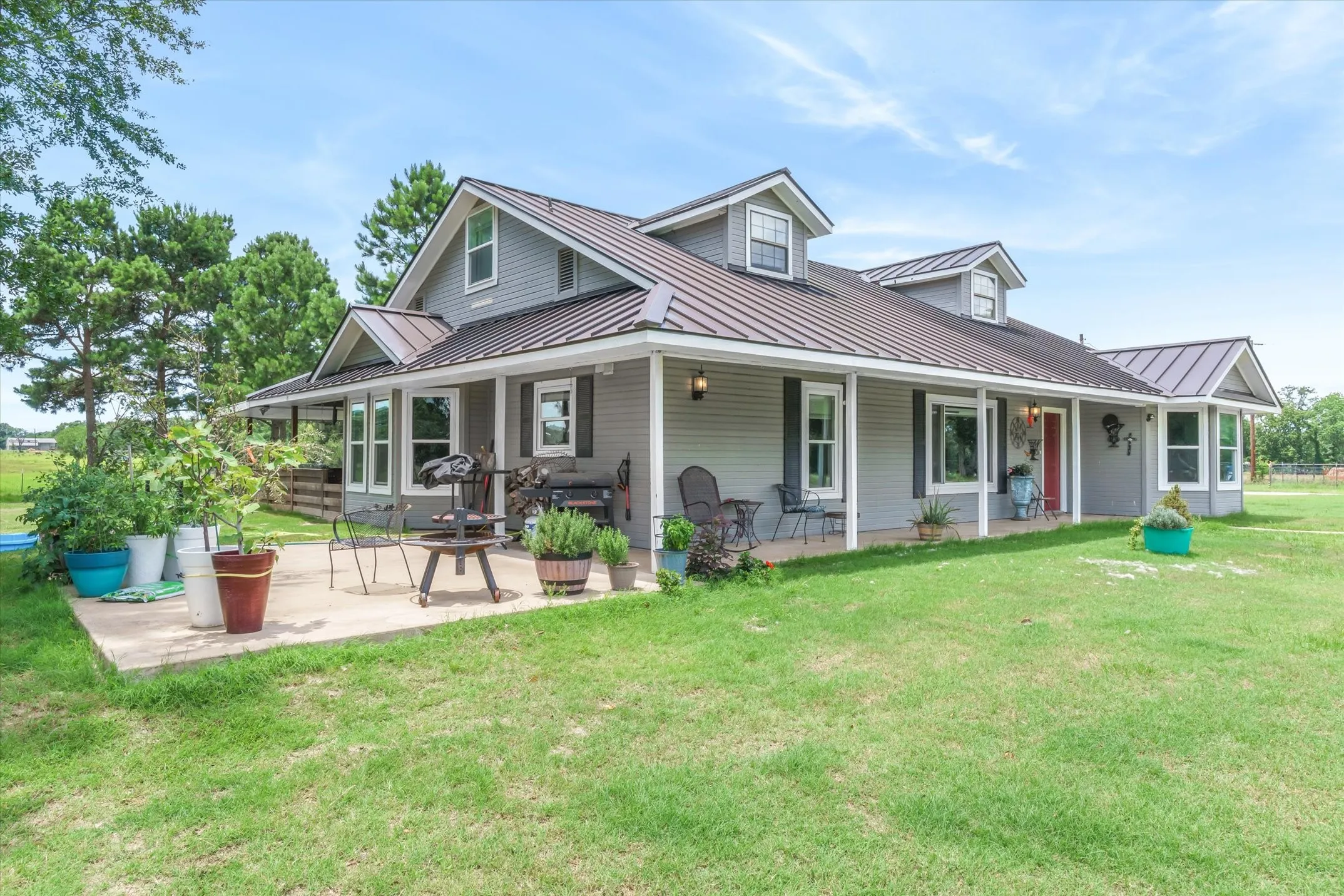 Welcome home to this modern farmhouse in beautiful East TX