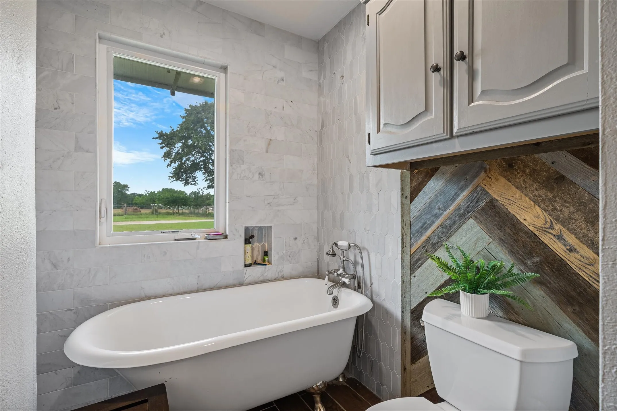 Would not be a true farmhouse without a clawfoot soaker tub!