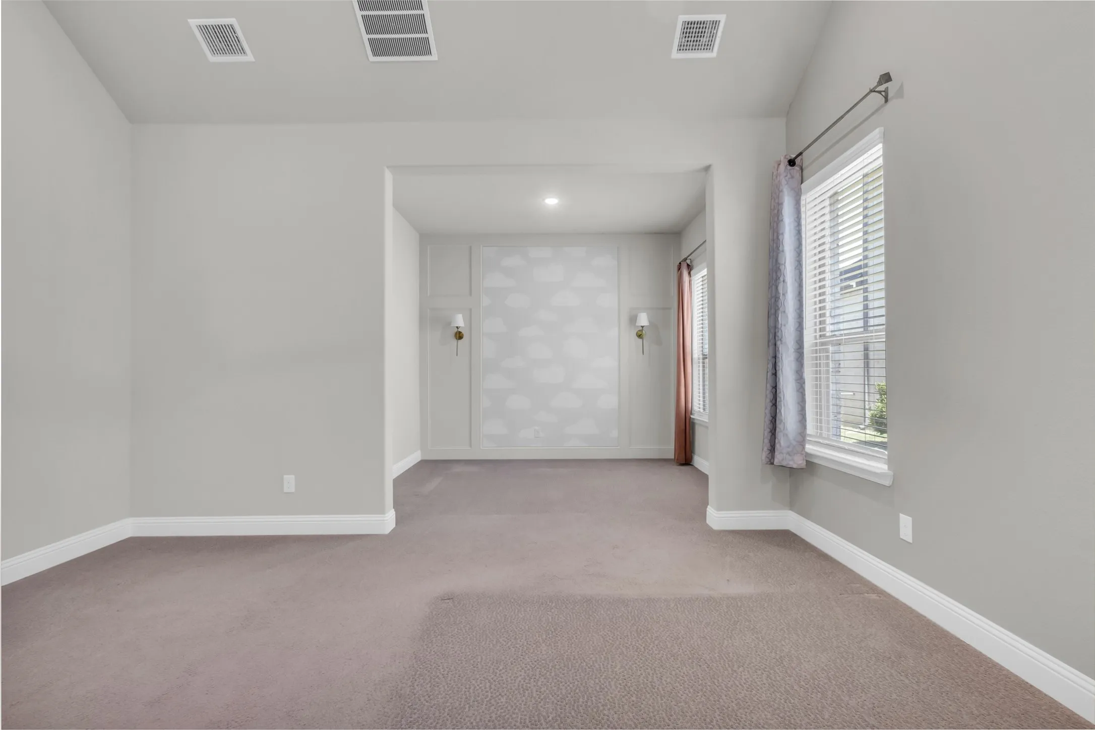 Empty room featuring carpet flooring