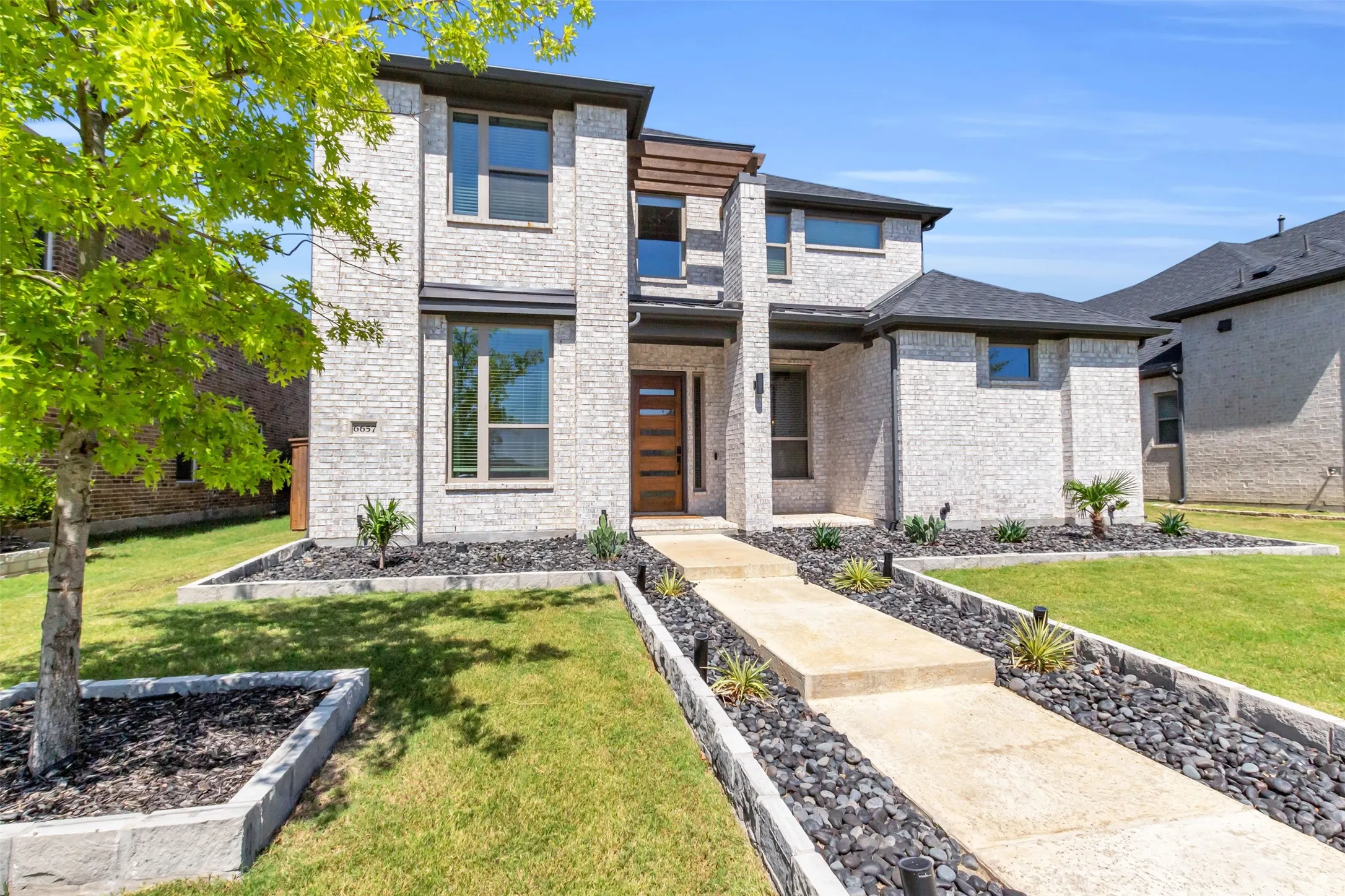 View of front of home with a front yard