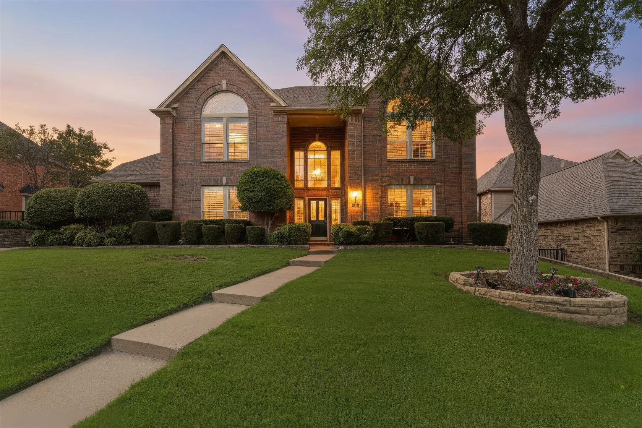 Sun sets in the back of this azaming home! Over the golf course.