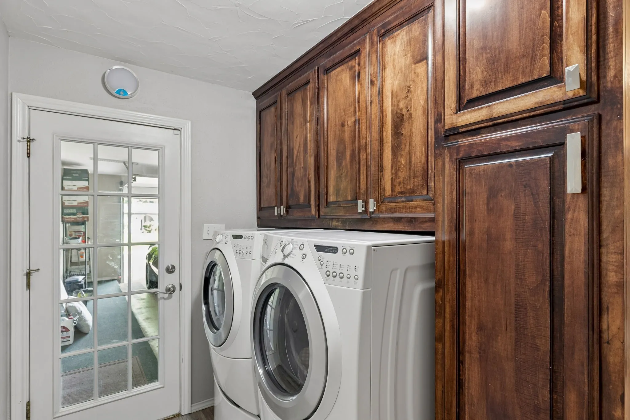 laundry / utility room opens to main garage.