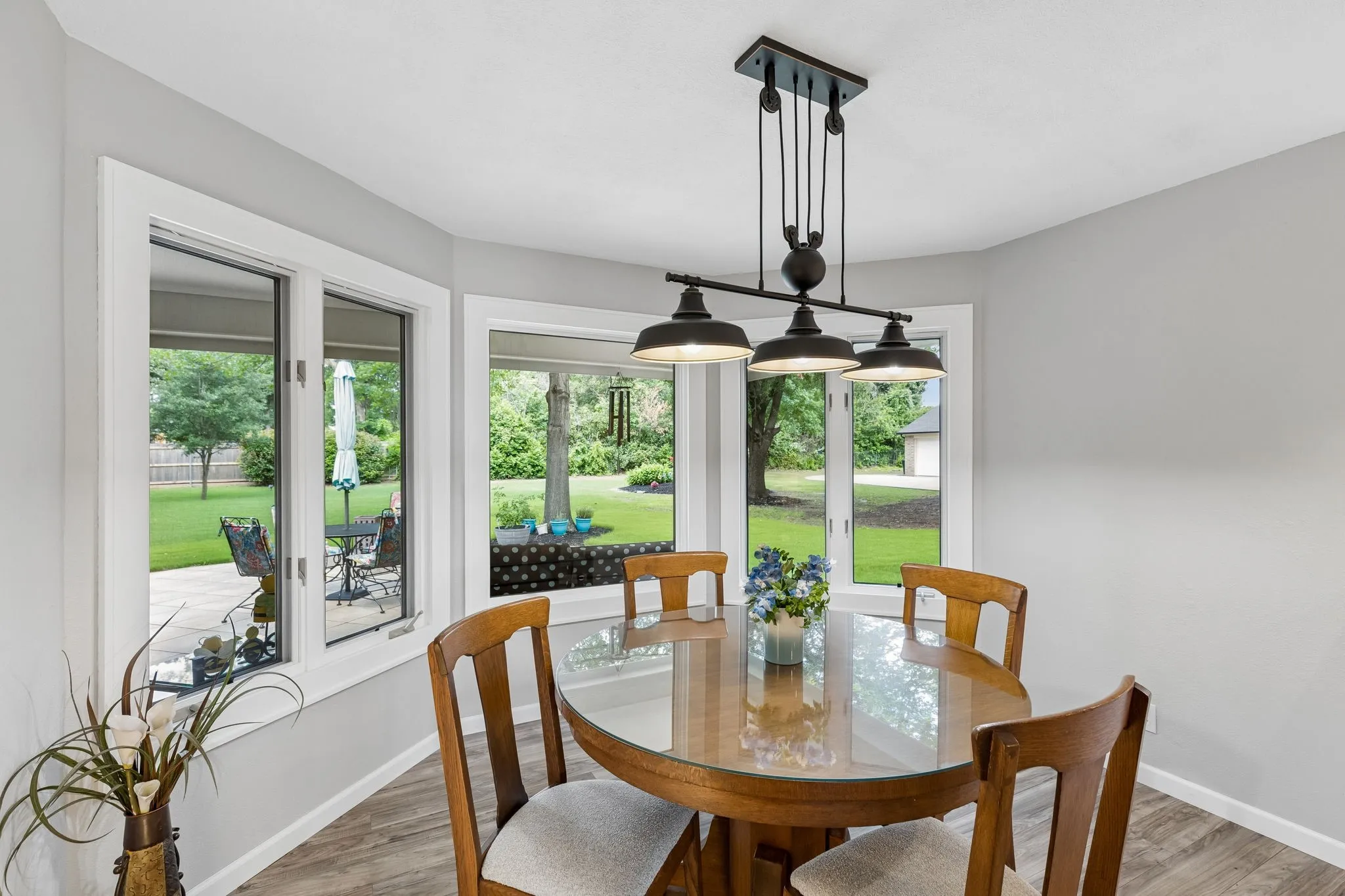 opens to beautiful backyard and kitchen