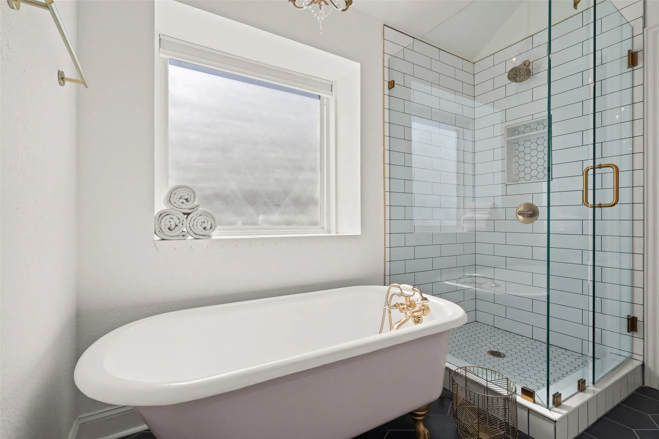 Freestanding tub with seamless glass shower