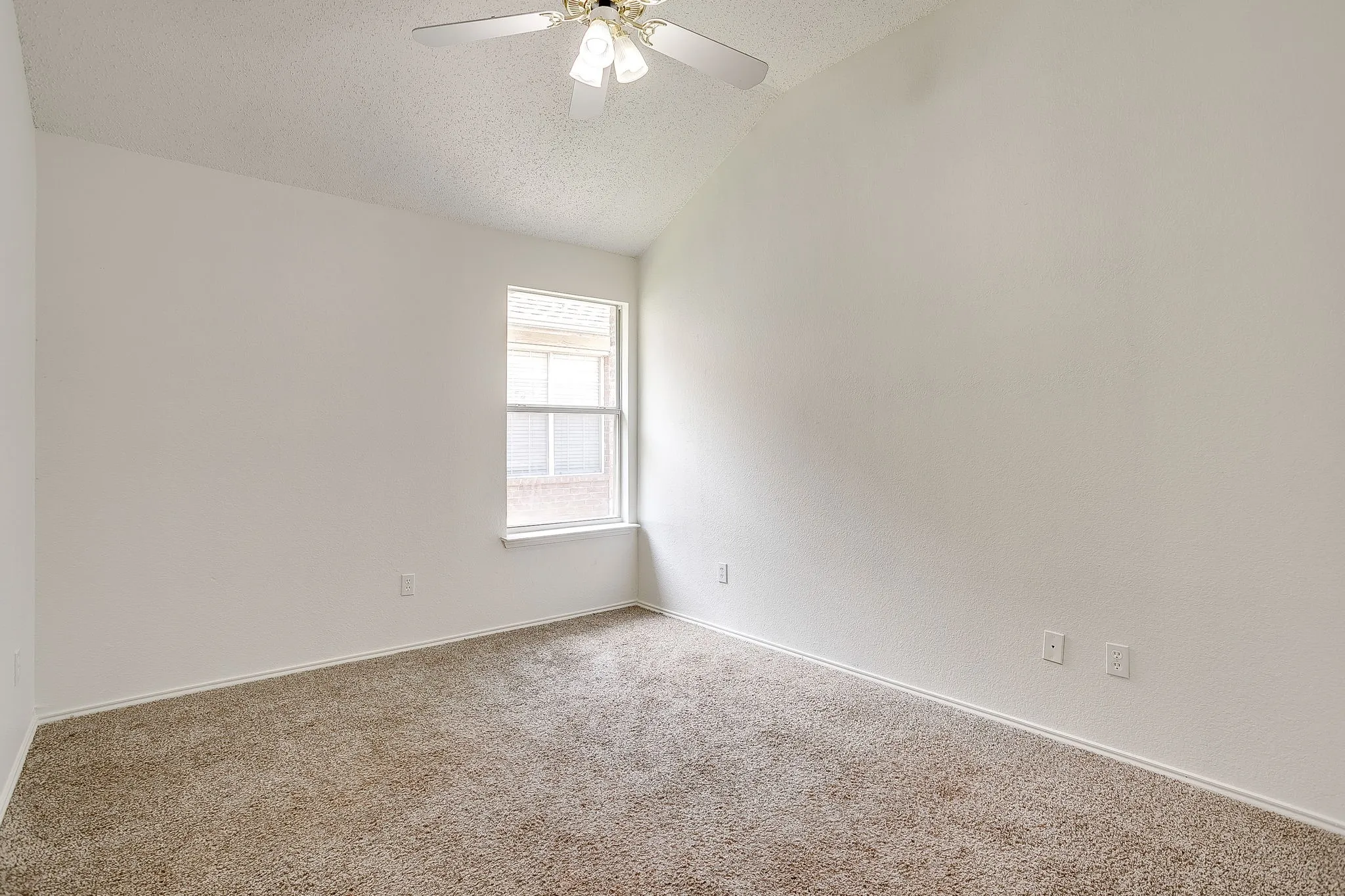Bedroom featuring a neutral color scheme.