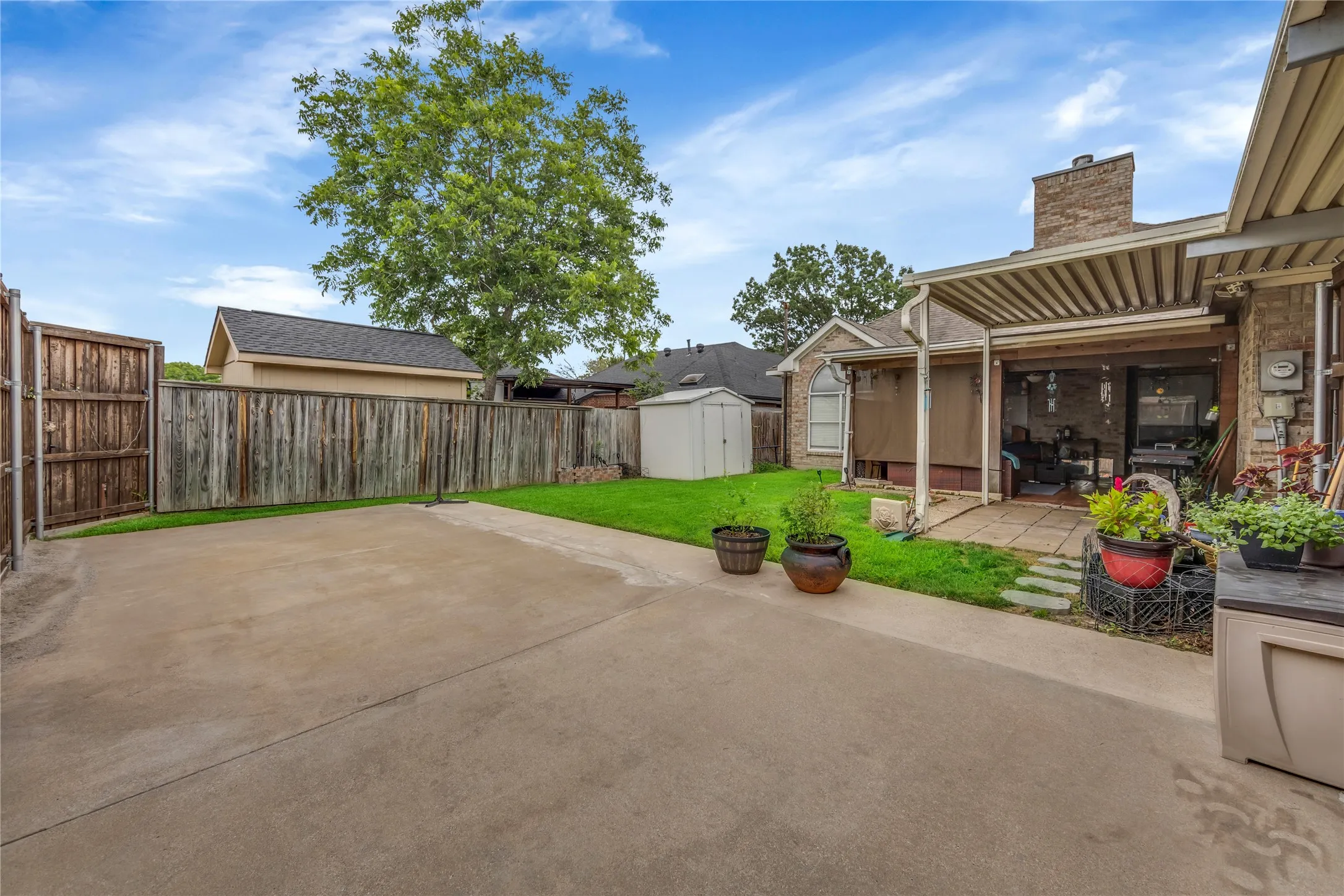 Backyard with large covered patio