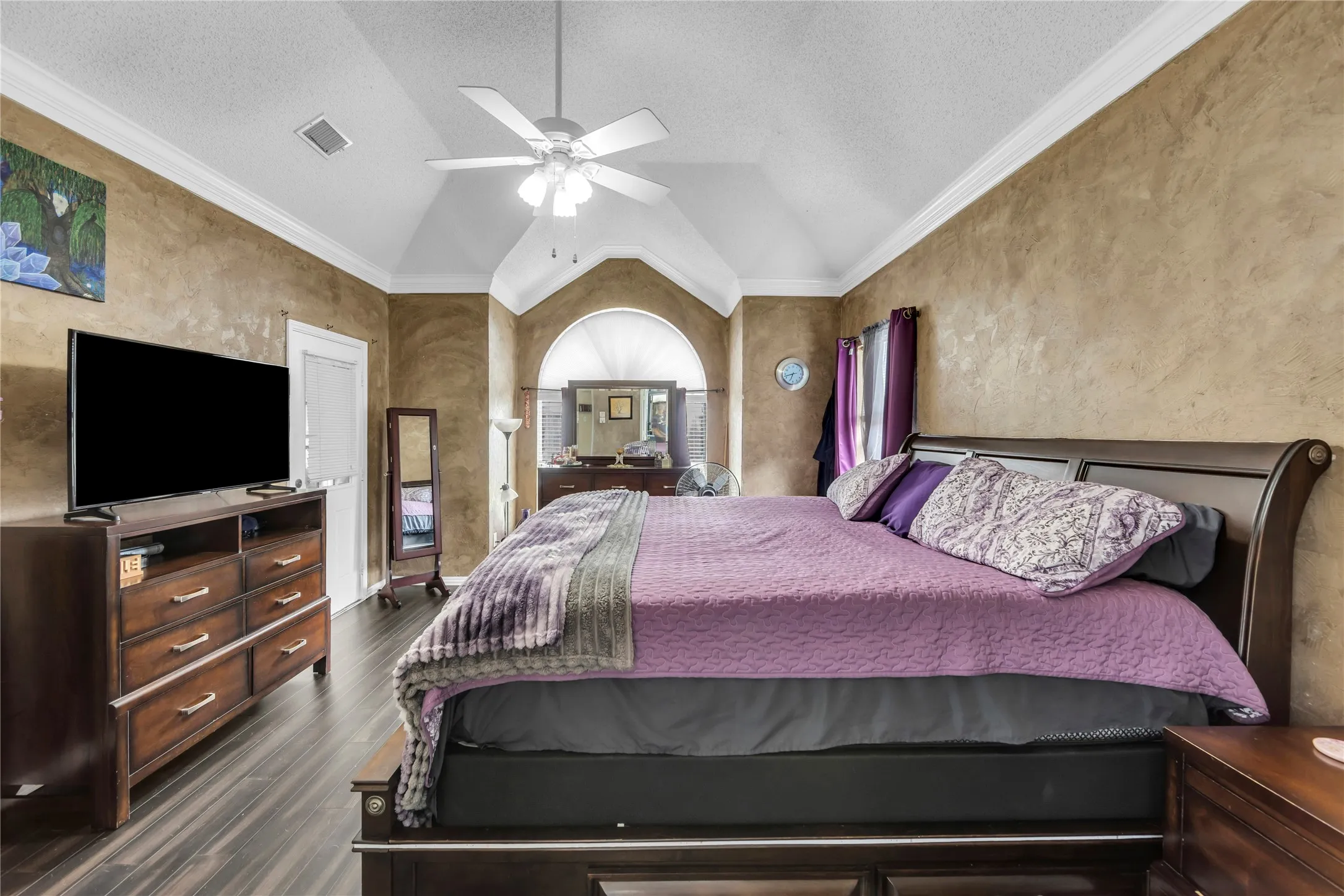 Primary bedroom with access to covered patio