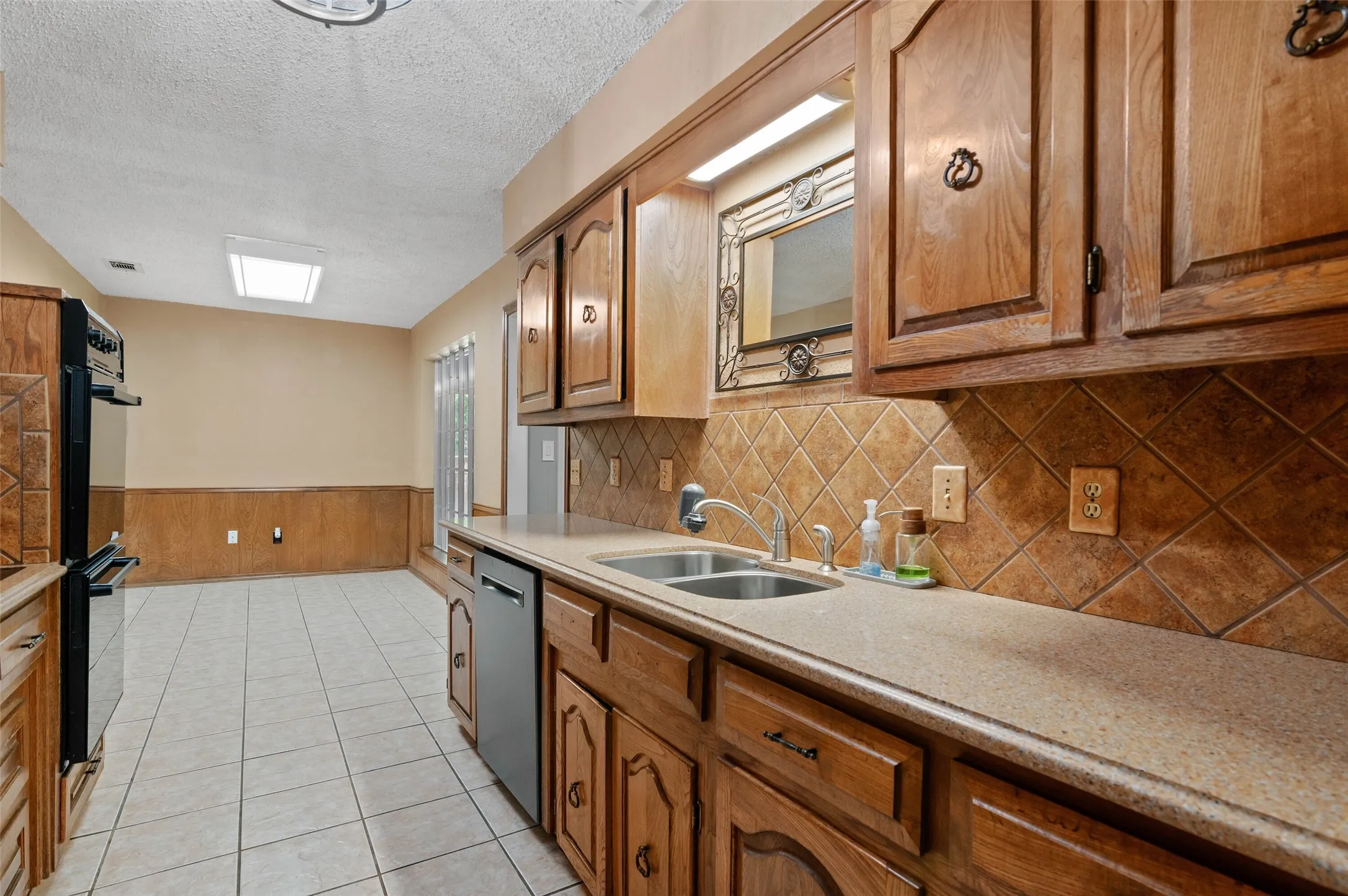 Galley kitchen with breakfast area