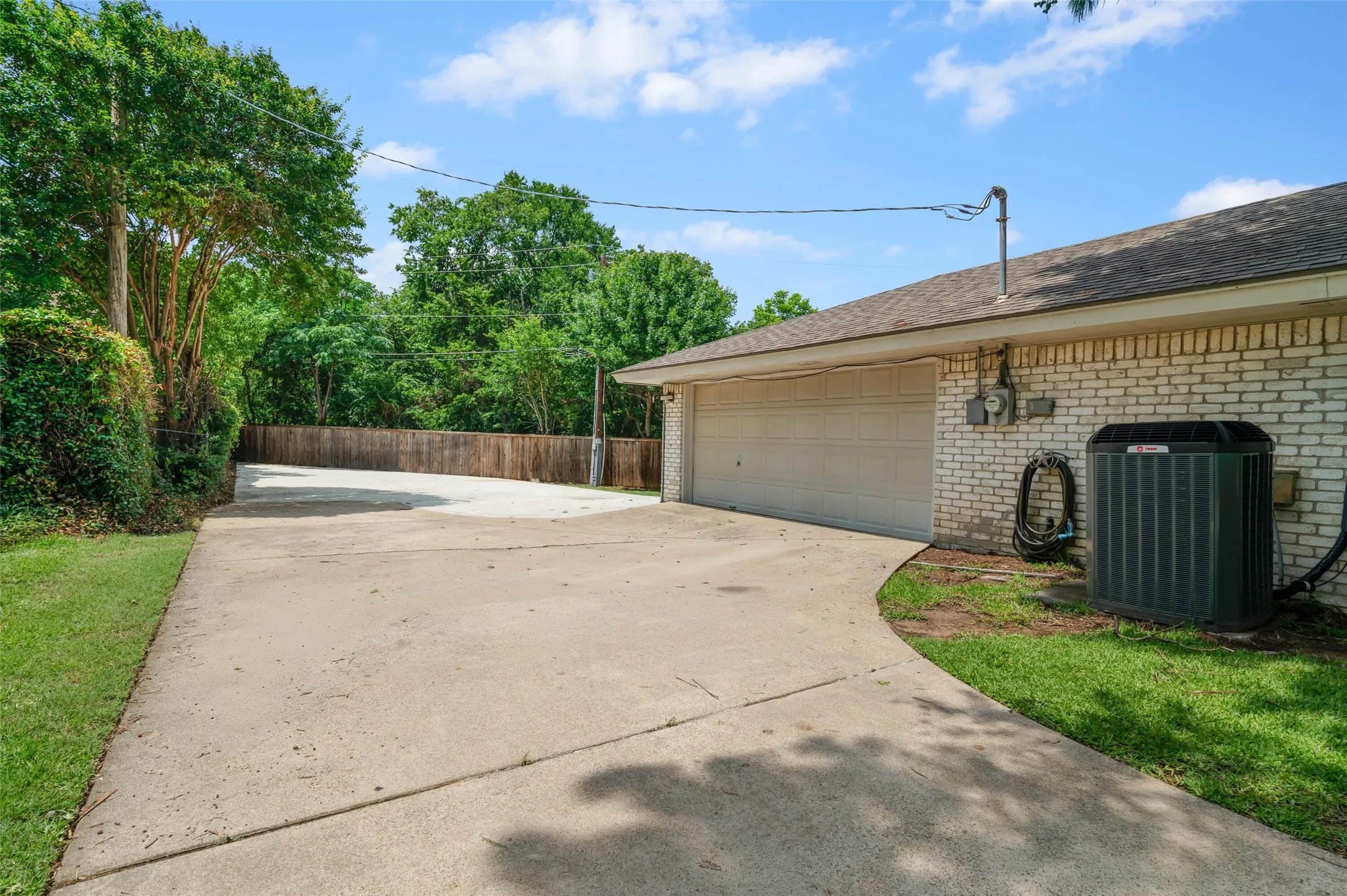 Driveway with extended parking pad