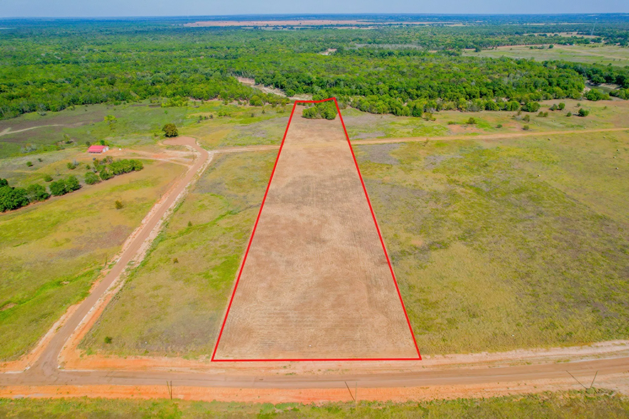 Room for animals, outdoor living, and a custom home in a gated acreage community.